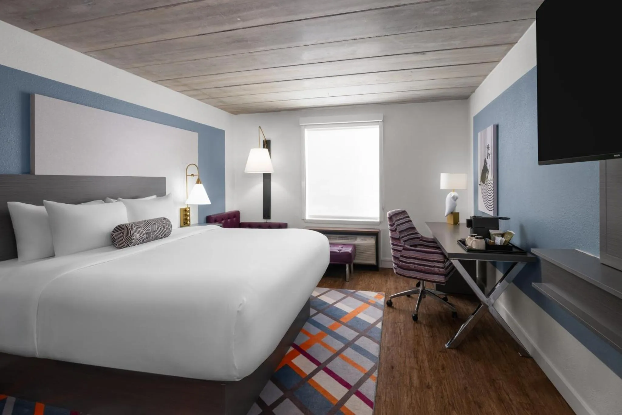 Photo of the whole room, Bed in voco College Station Aggieland by IHG