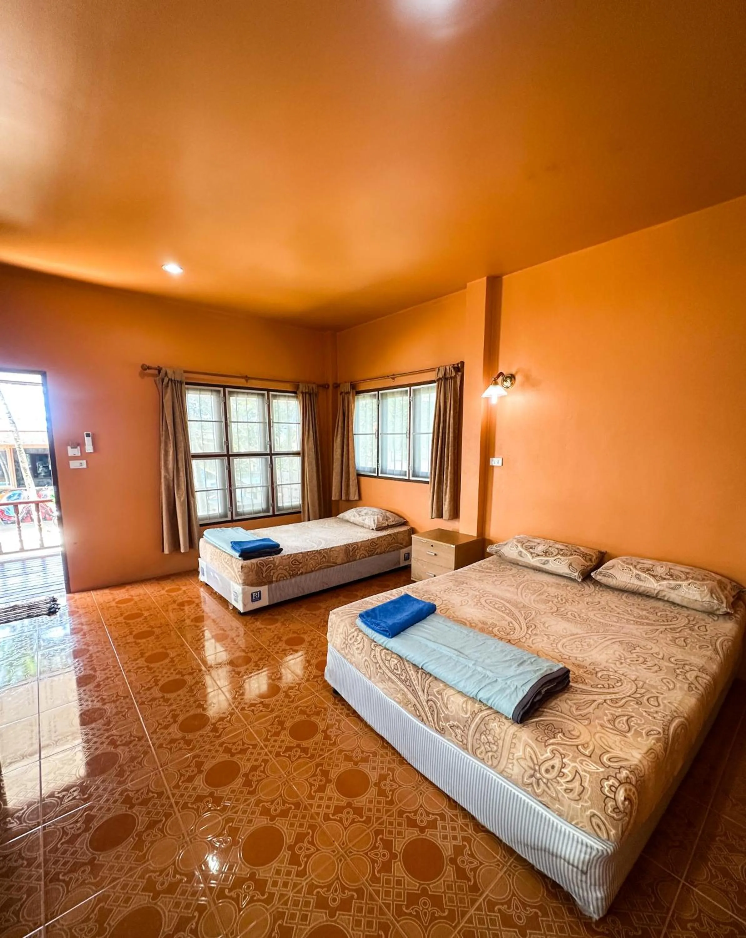 Bed in O'chai Bungalows