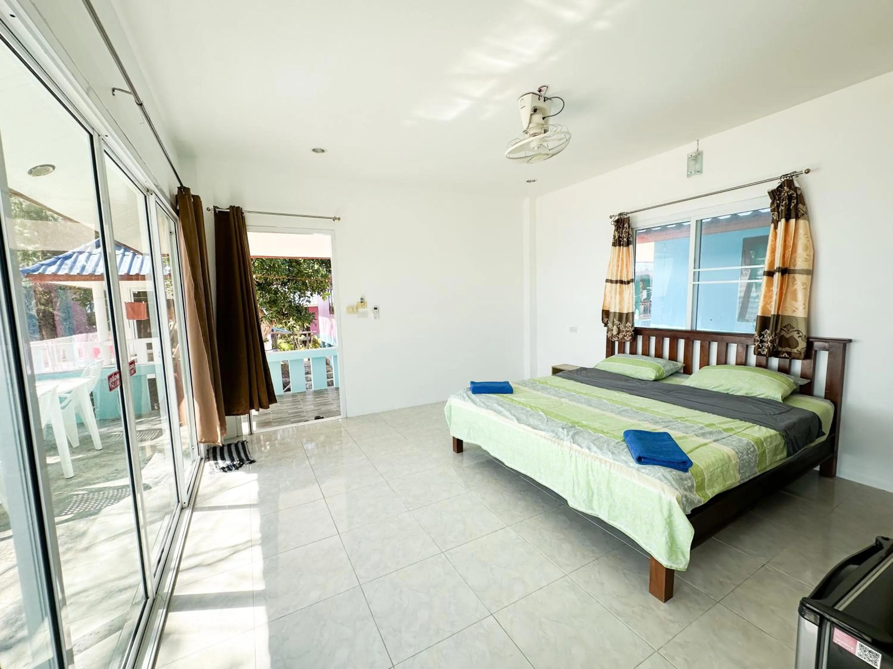 Bed in O'chai Bungalows