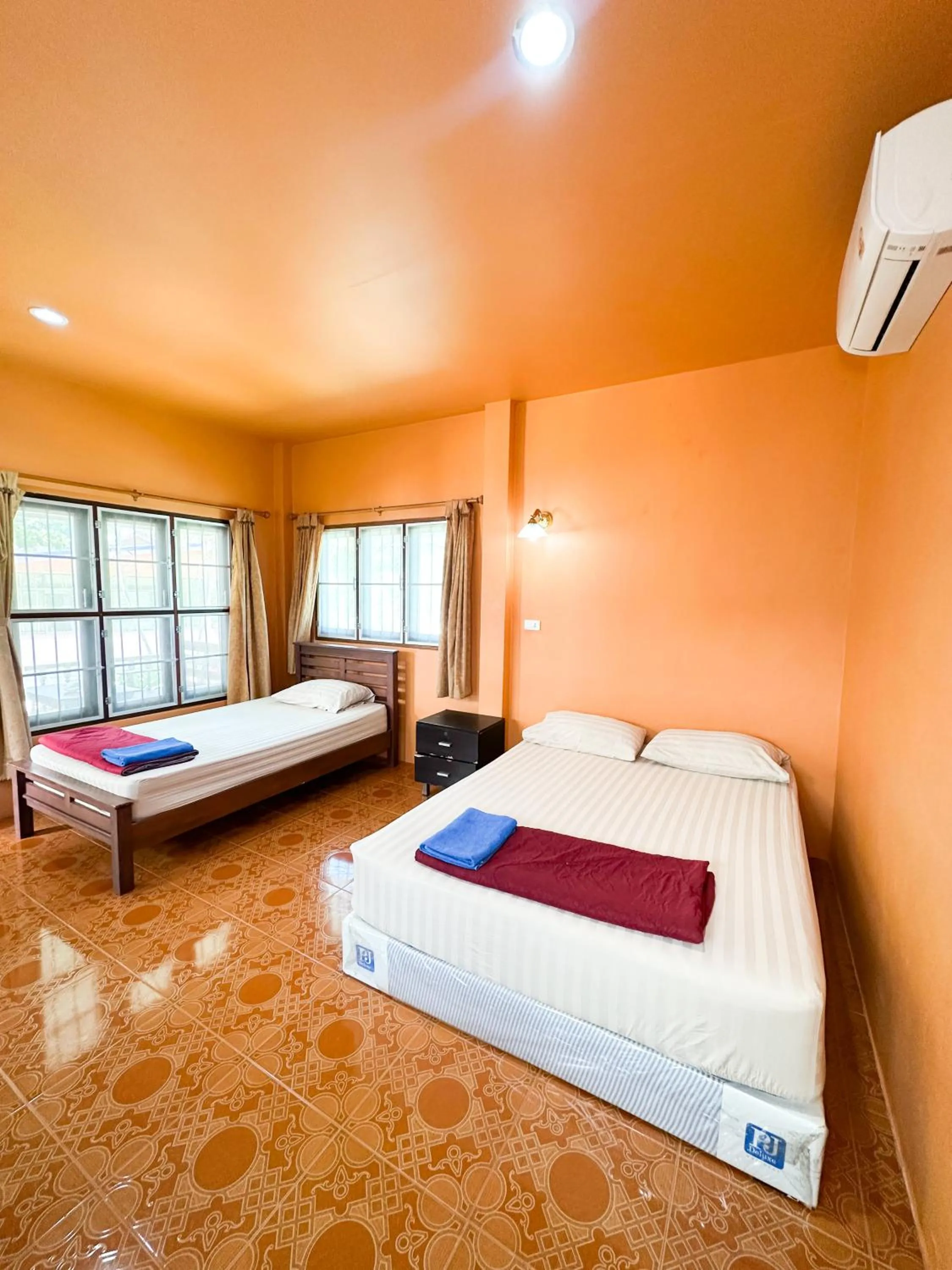 Bed in O'chai Bungalows