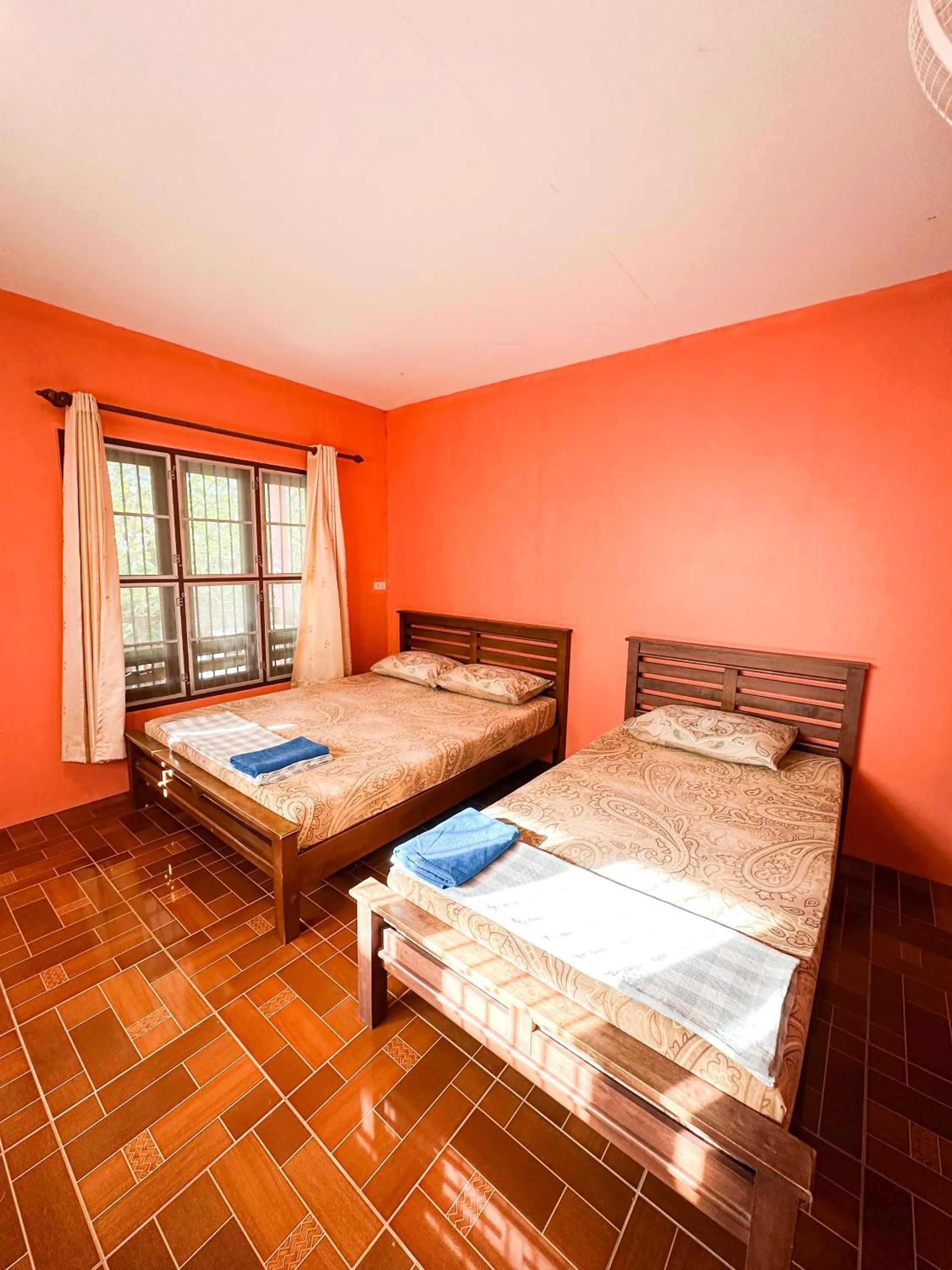 Bed in O'chai Bungalows