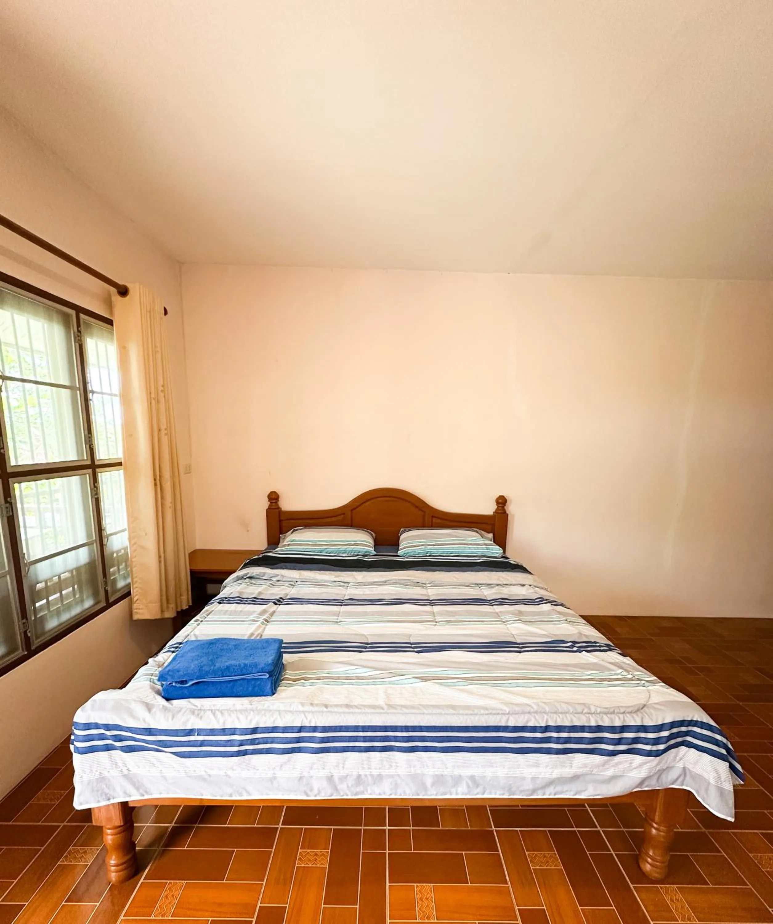 Bed in O'chai Bungalows