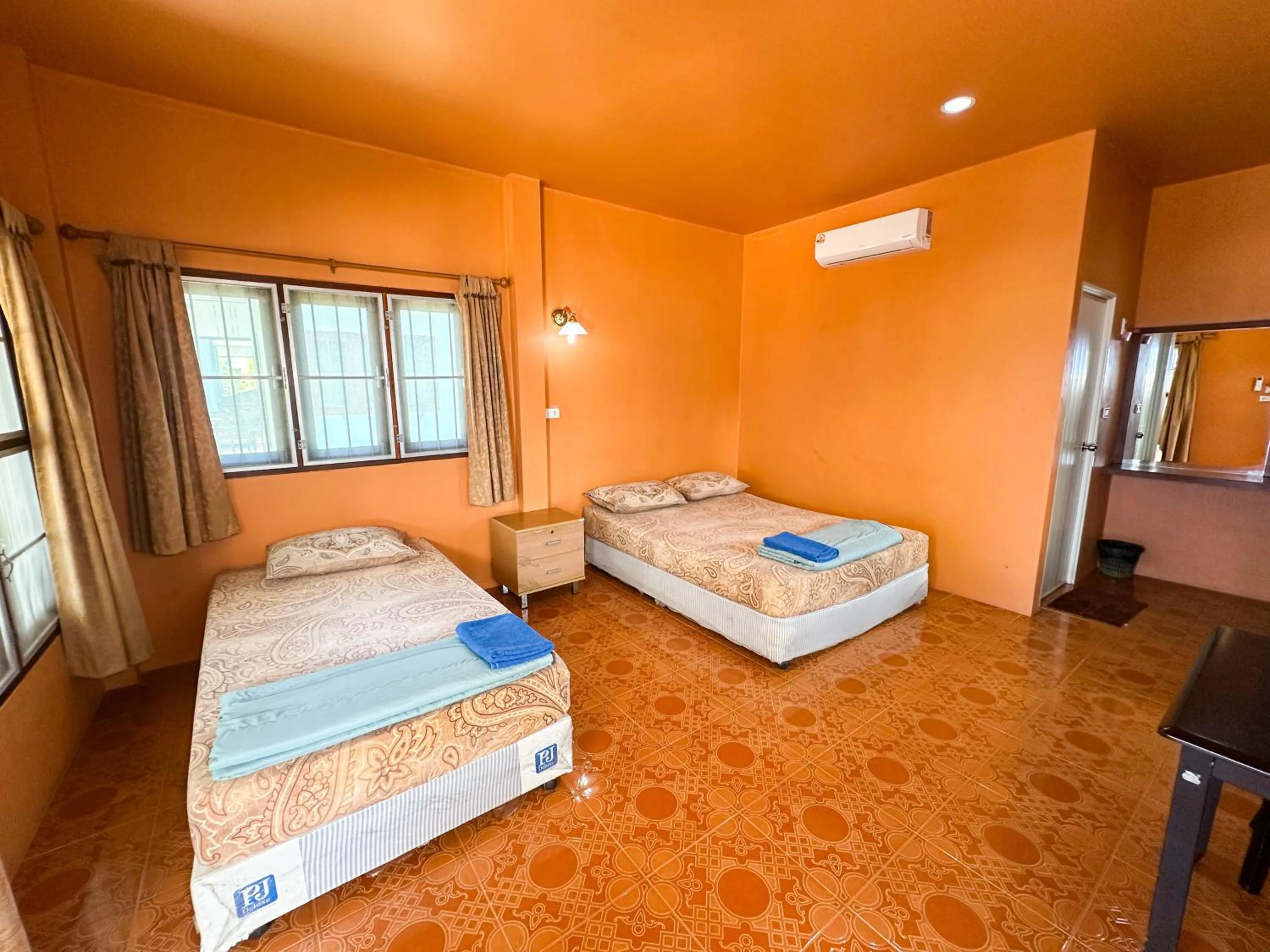 Bed in O'chai Bungalows