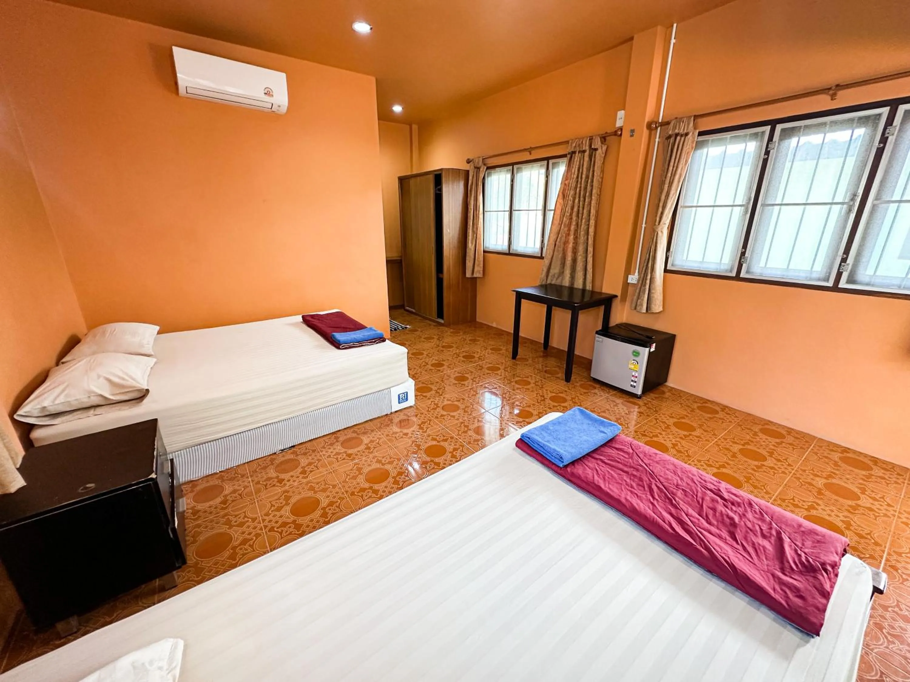 Bed in O'chai Bungalows