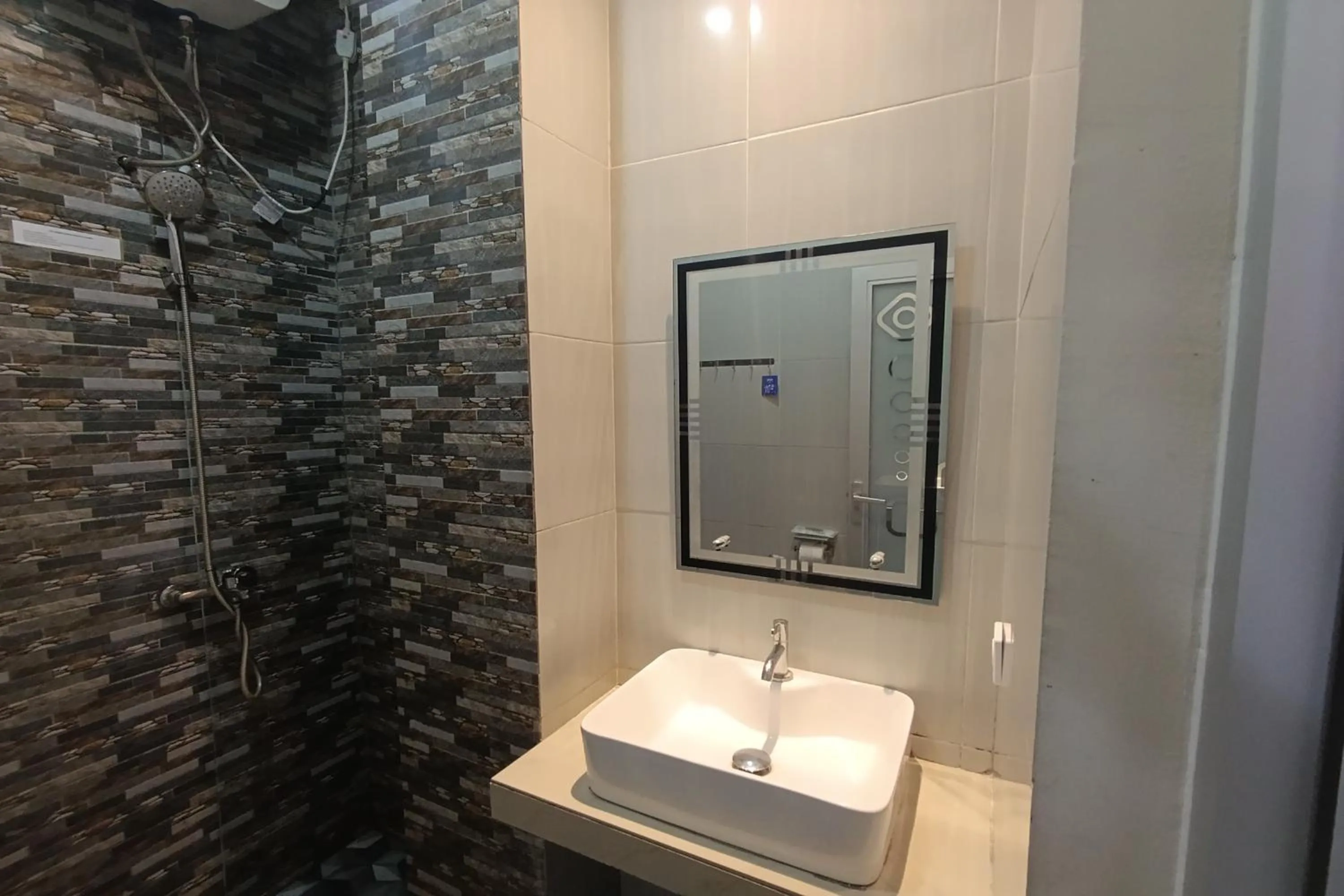 Bathroom in Mamifokobo Hotel & Glamping