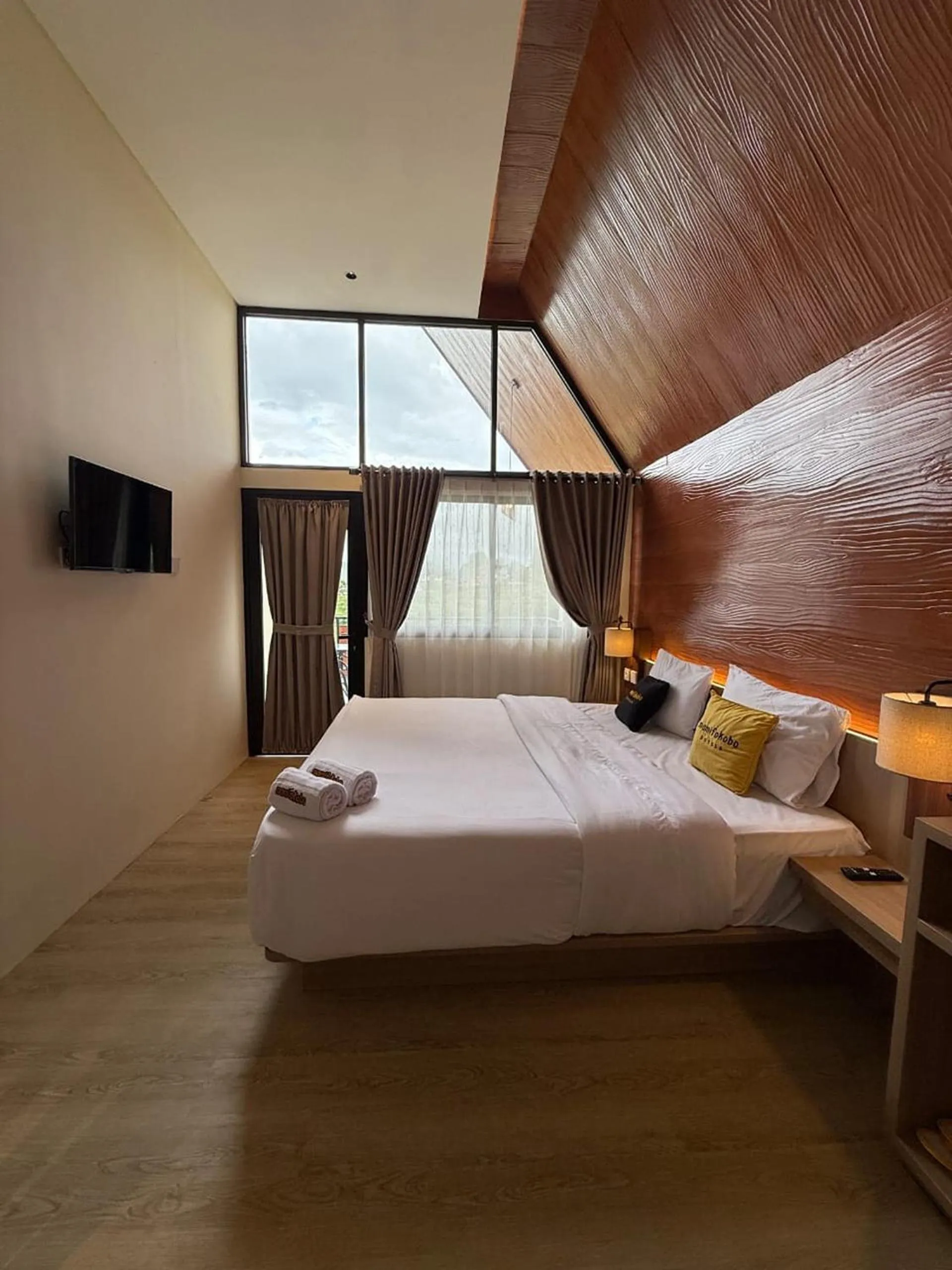 Bed in Mamifokobo Hotel & Glamping