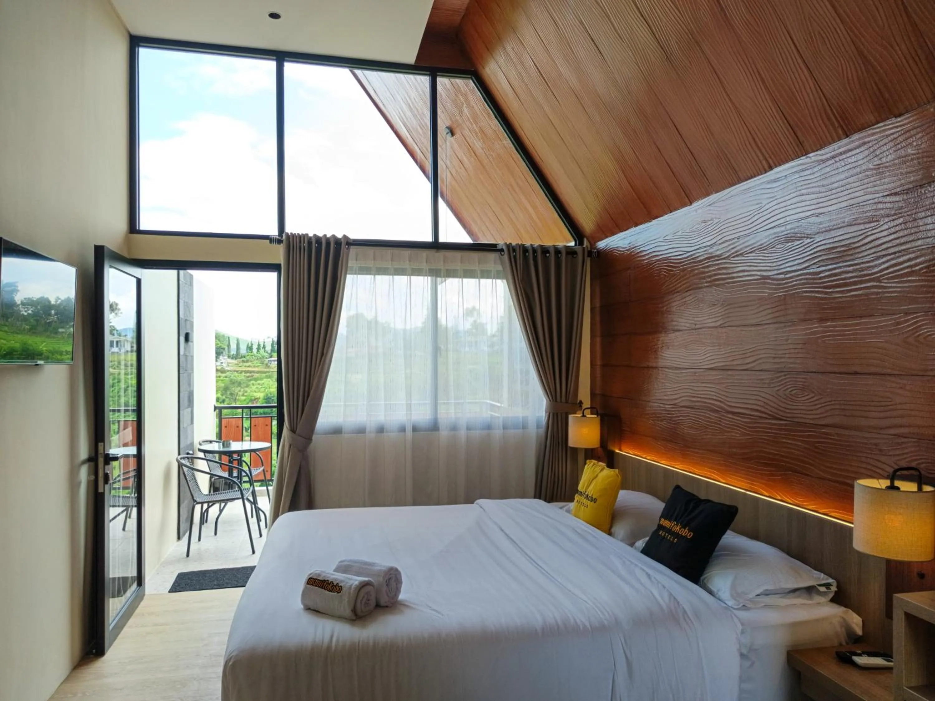 Bed in Mamifokobo Hotel & Glamping
