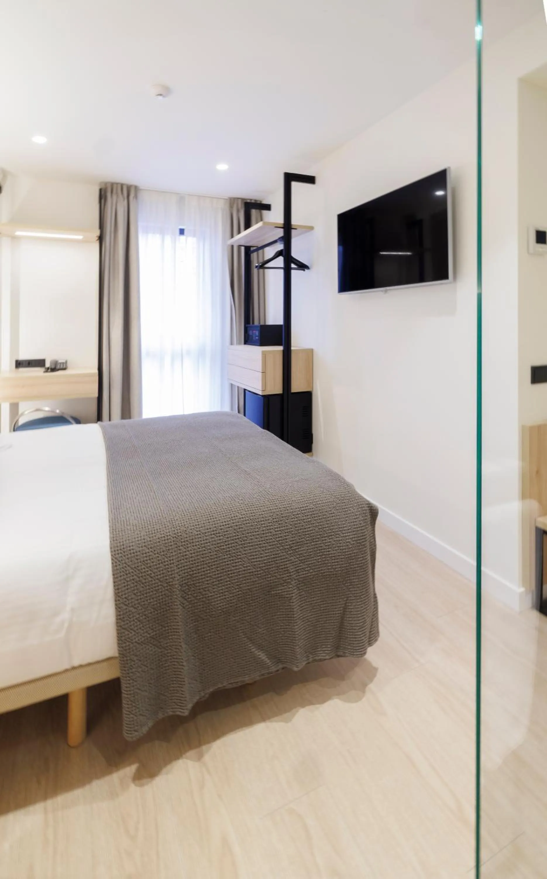 Photo of the whole room, Bed in Inn Boutique León