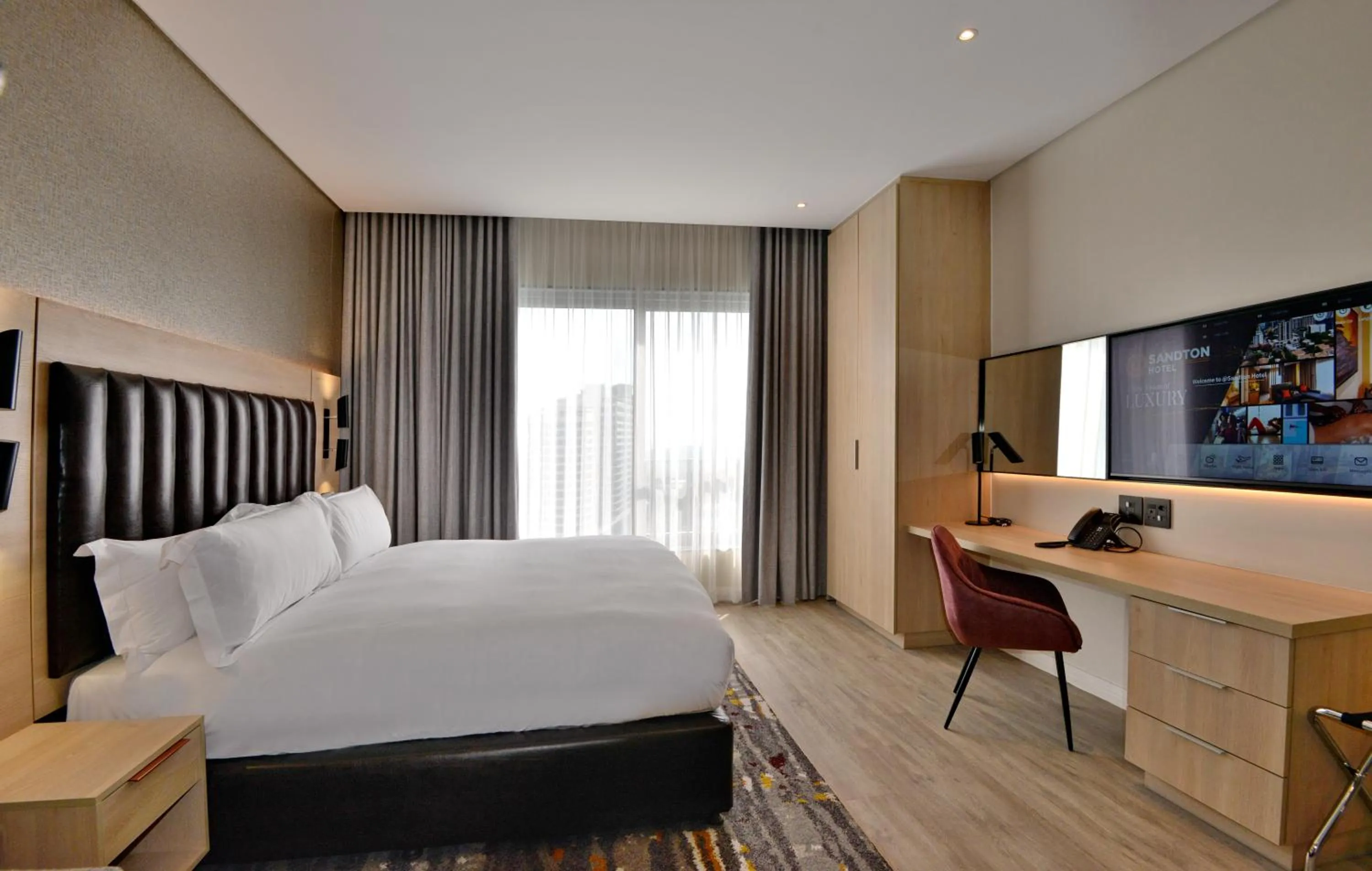 Photo of the whole room, Bed in @Sandton Hotel