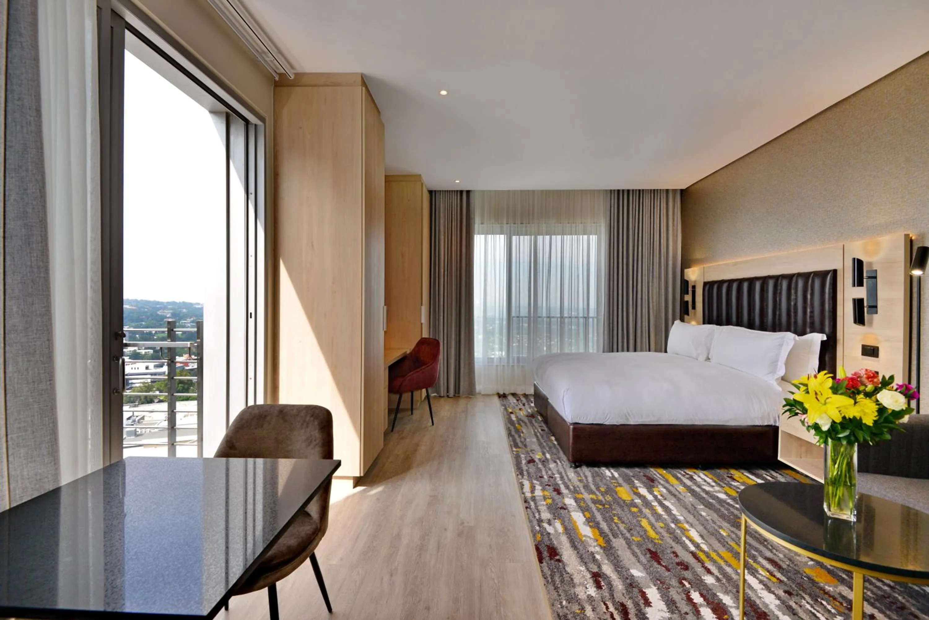 Photo of the whole room, Bed in @Sandton Hotel