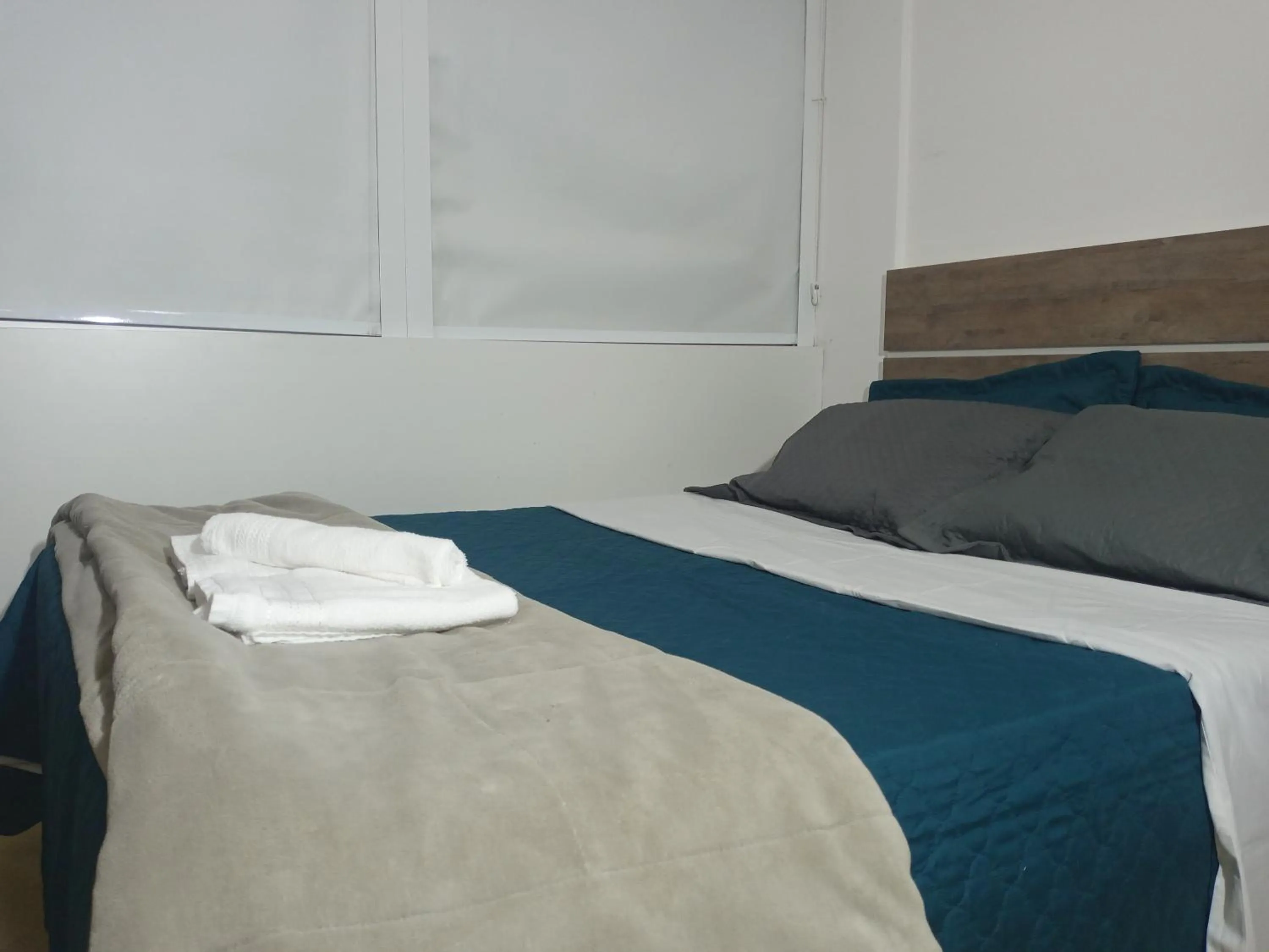 Bed in Apartamento encantador em Curitiba