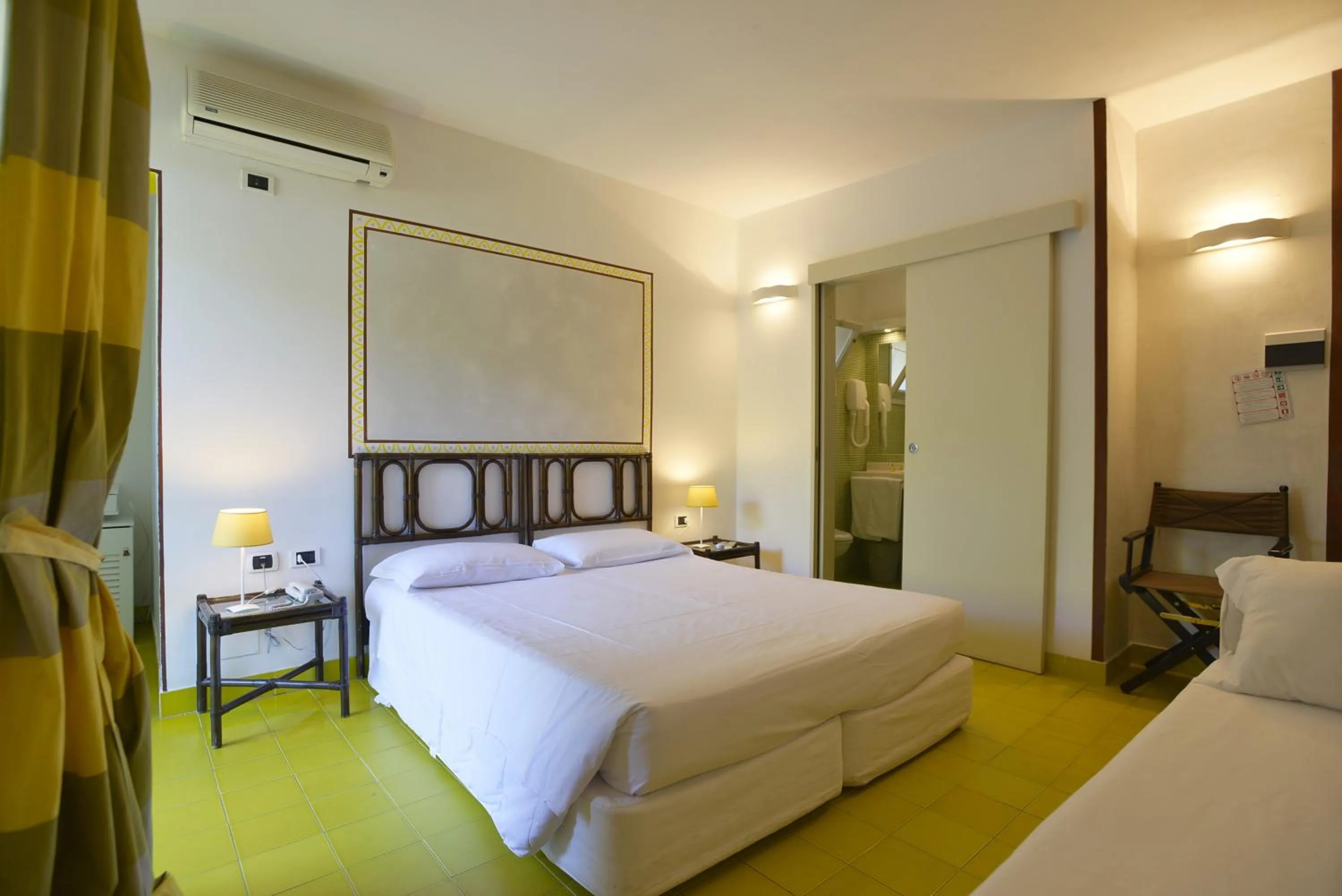 Bed in UNAHOTELS Club Hotel Ancora