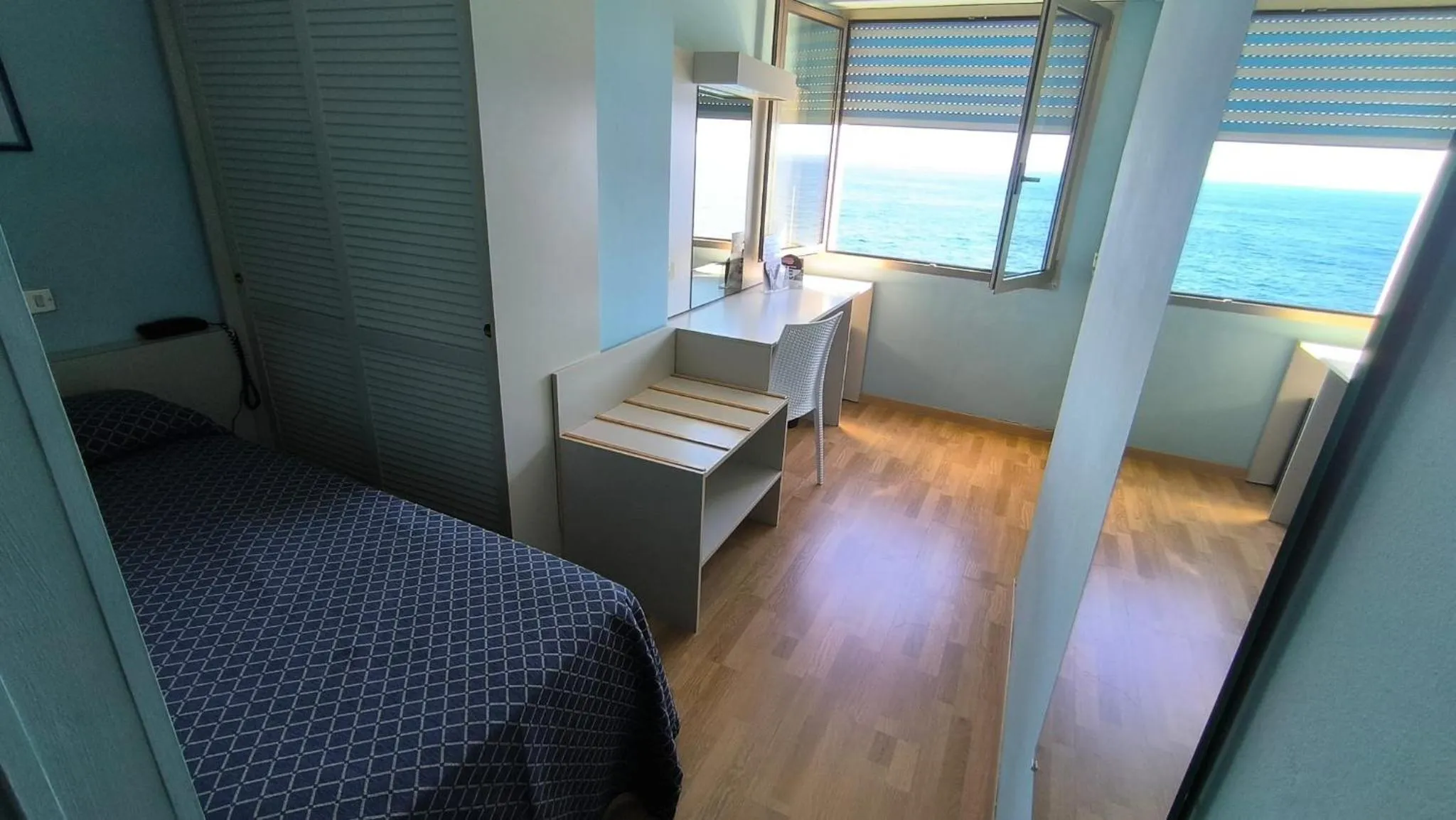 Bedroom in Hotel La Perla Del Capo