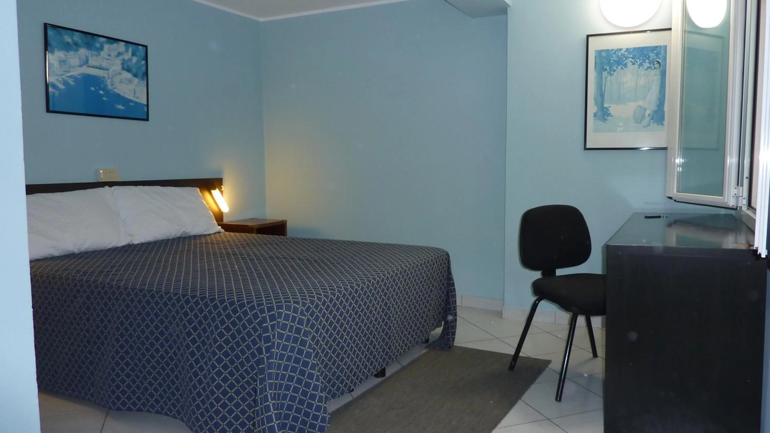 TV and multimedia in Hotel La Perla Del Capo