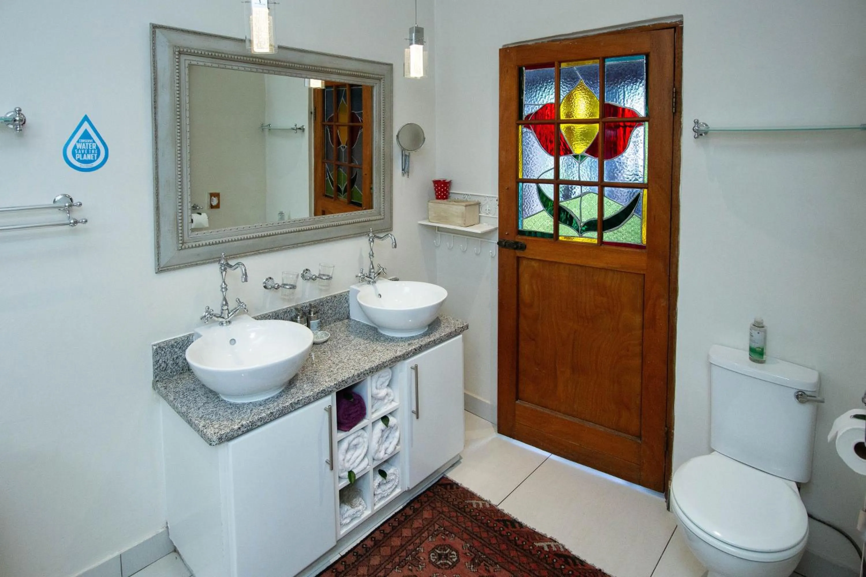 Toilet in Oleander Guest House