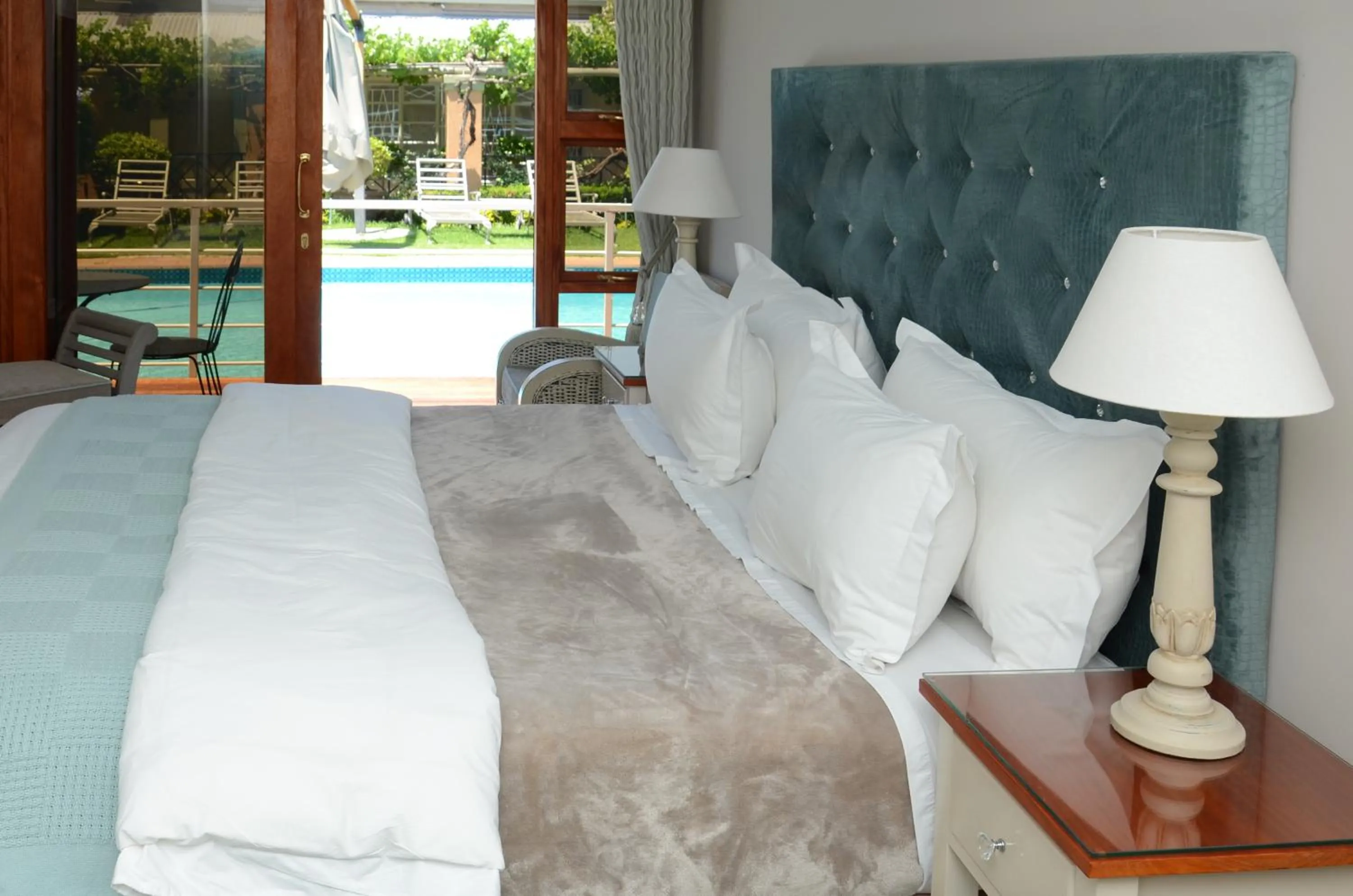 Pool view, Bed in Oleander Guest House