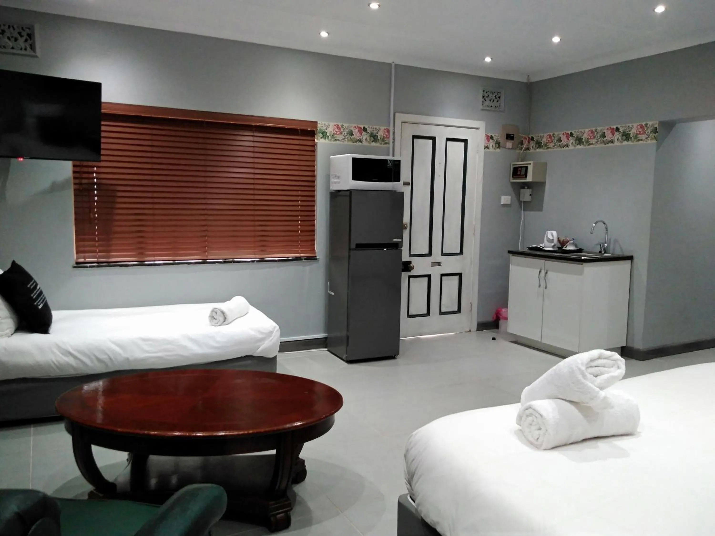 Bed in Heroes Garden Lodge