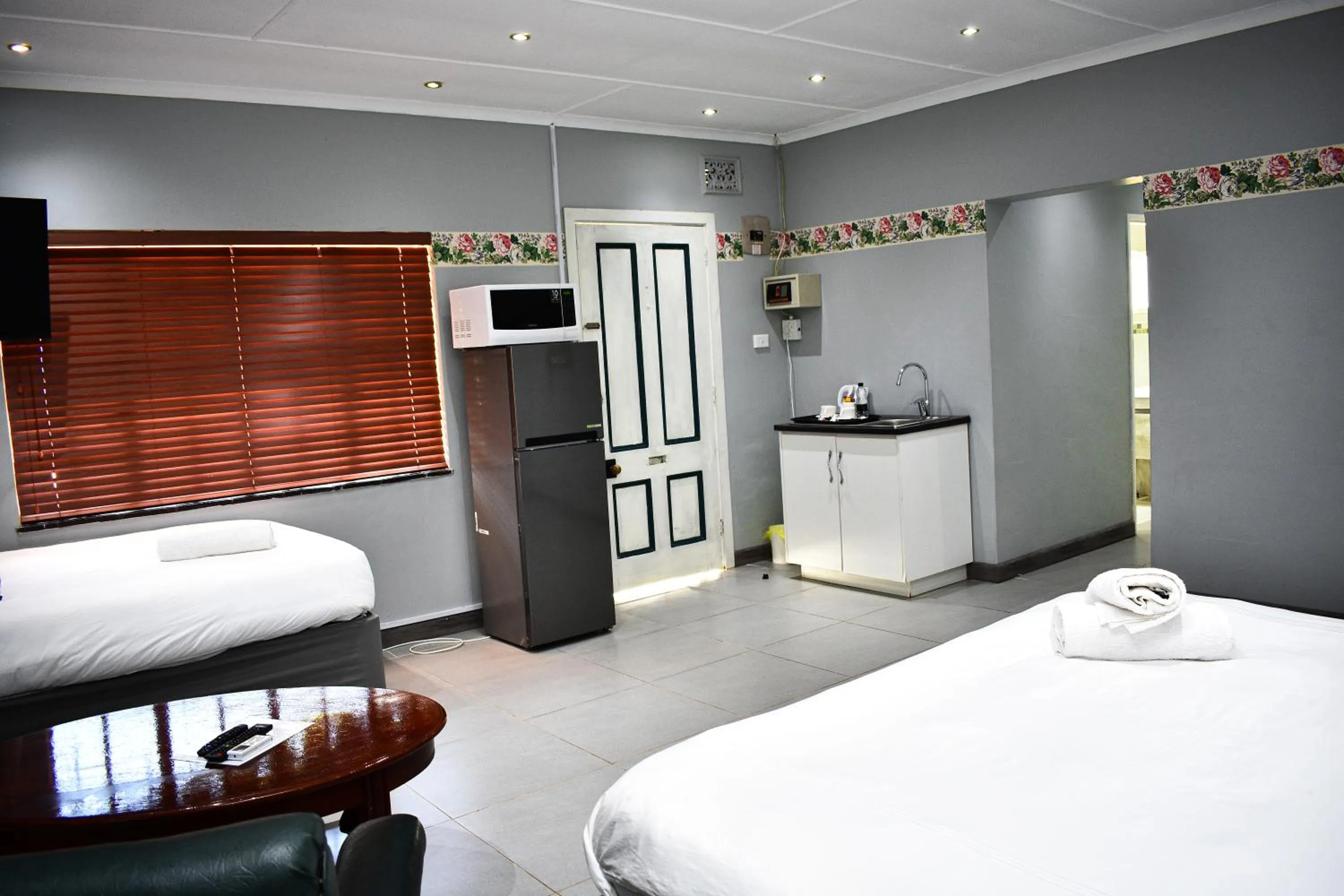 Bed in Heroes Garden Lodge