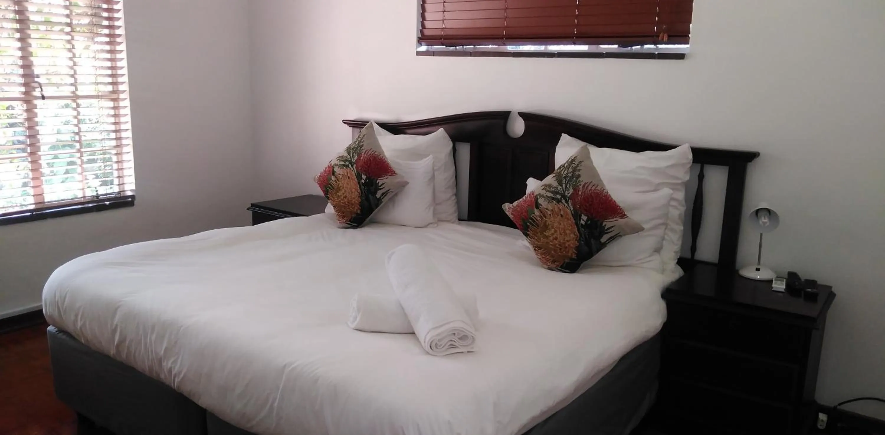 Bed in Heroes Garden Lodge