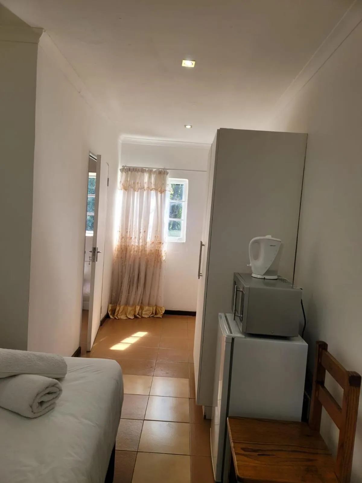 Bed in Heroes Garden Lodge