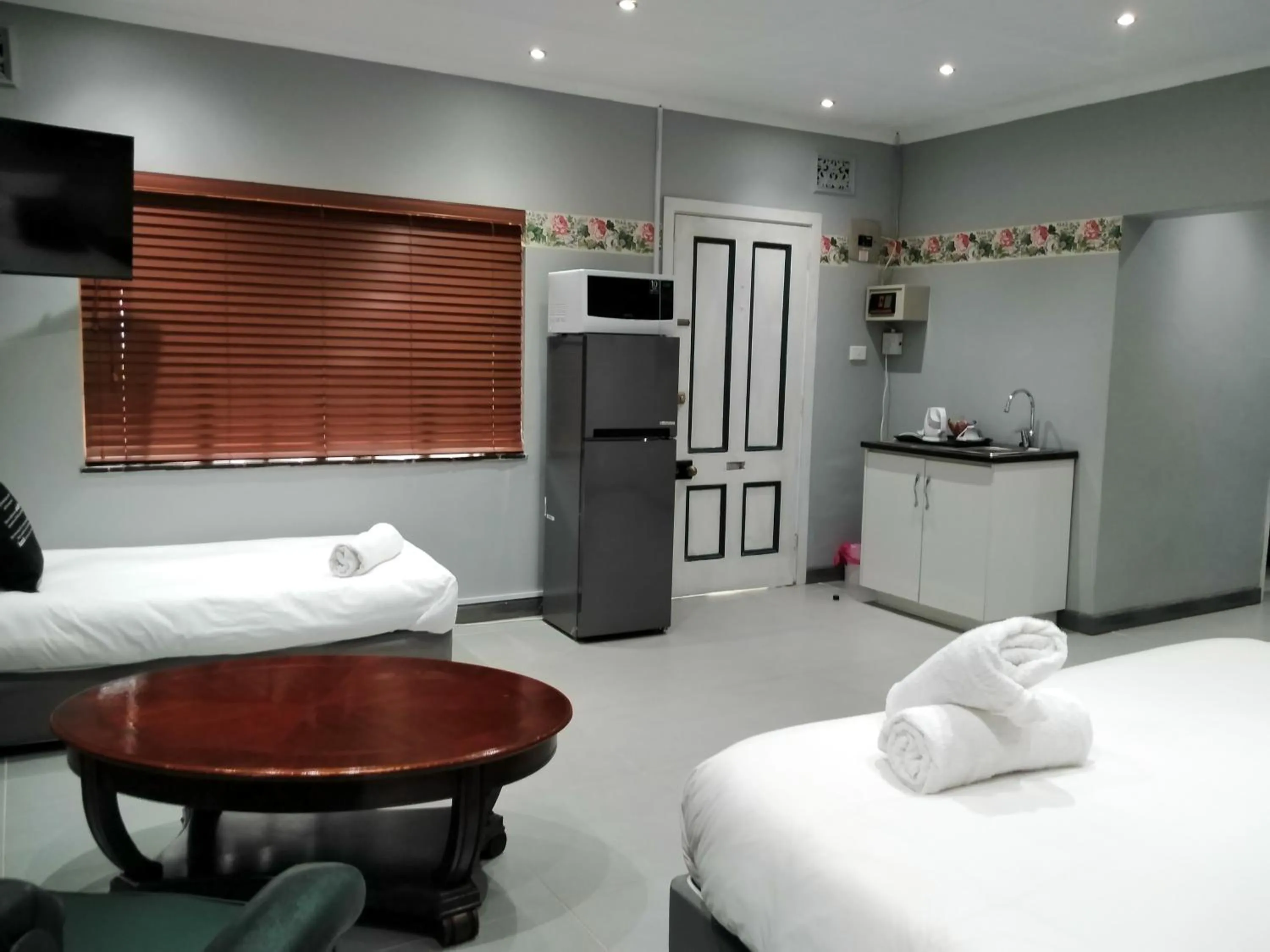 Bed in Heroes Garden Lodge