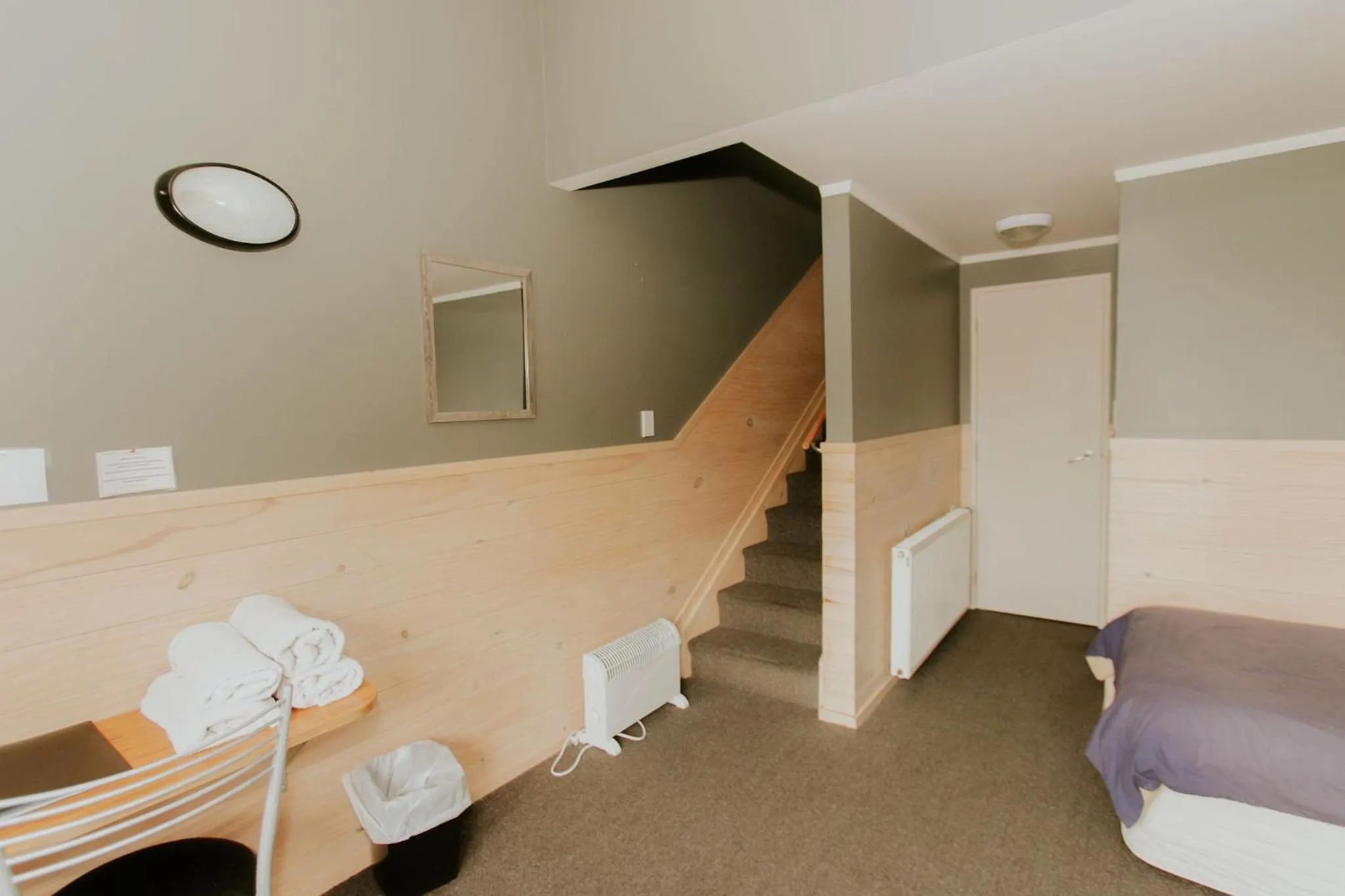 Bedroom, Bed in Waitomo Village Chalets home of Kiwipaka