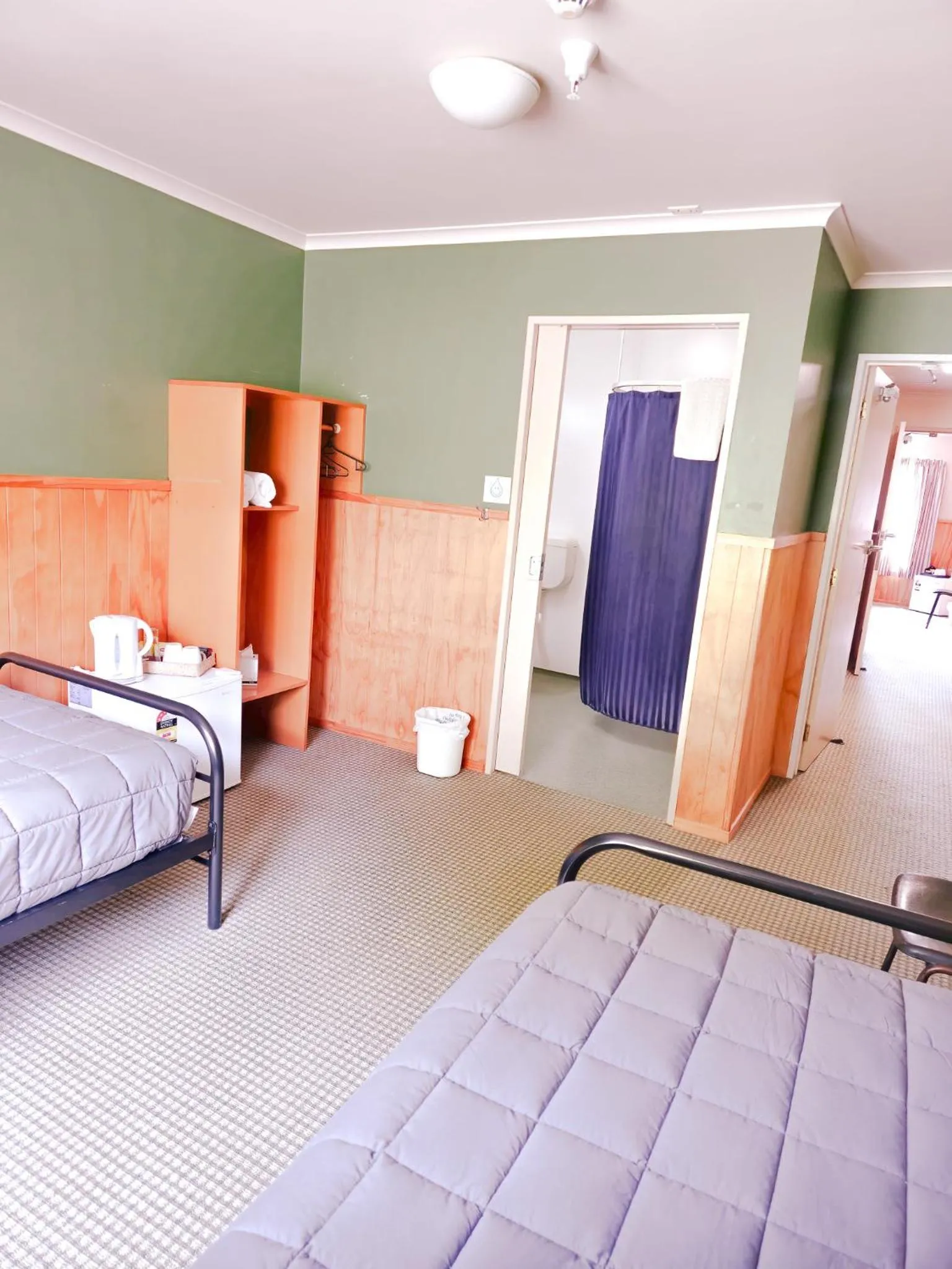 Photo of the whole room, Bed in Waitomo Village Chalets home of Kiwipaka
