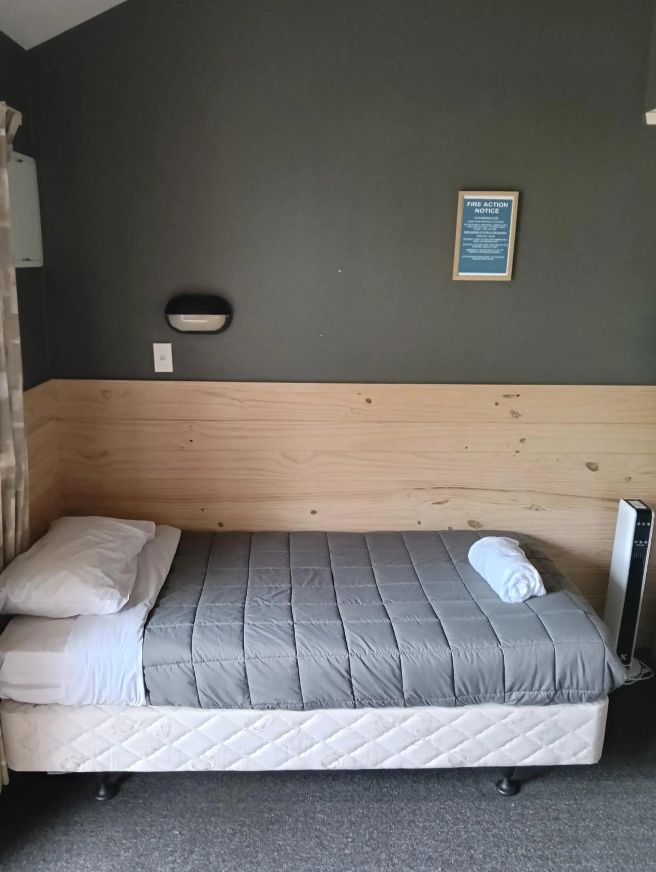 Bed in Waitomo Village Chalets home of Kiwipaka