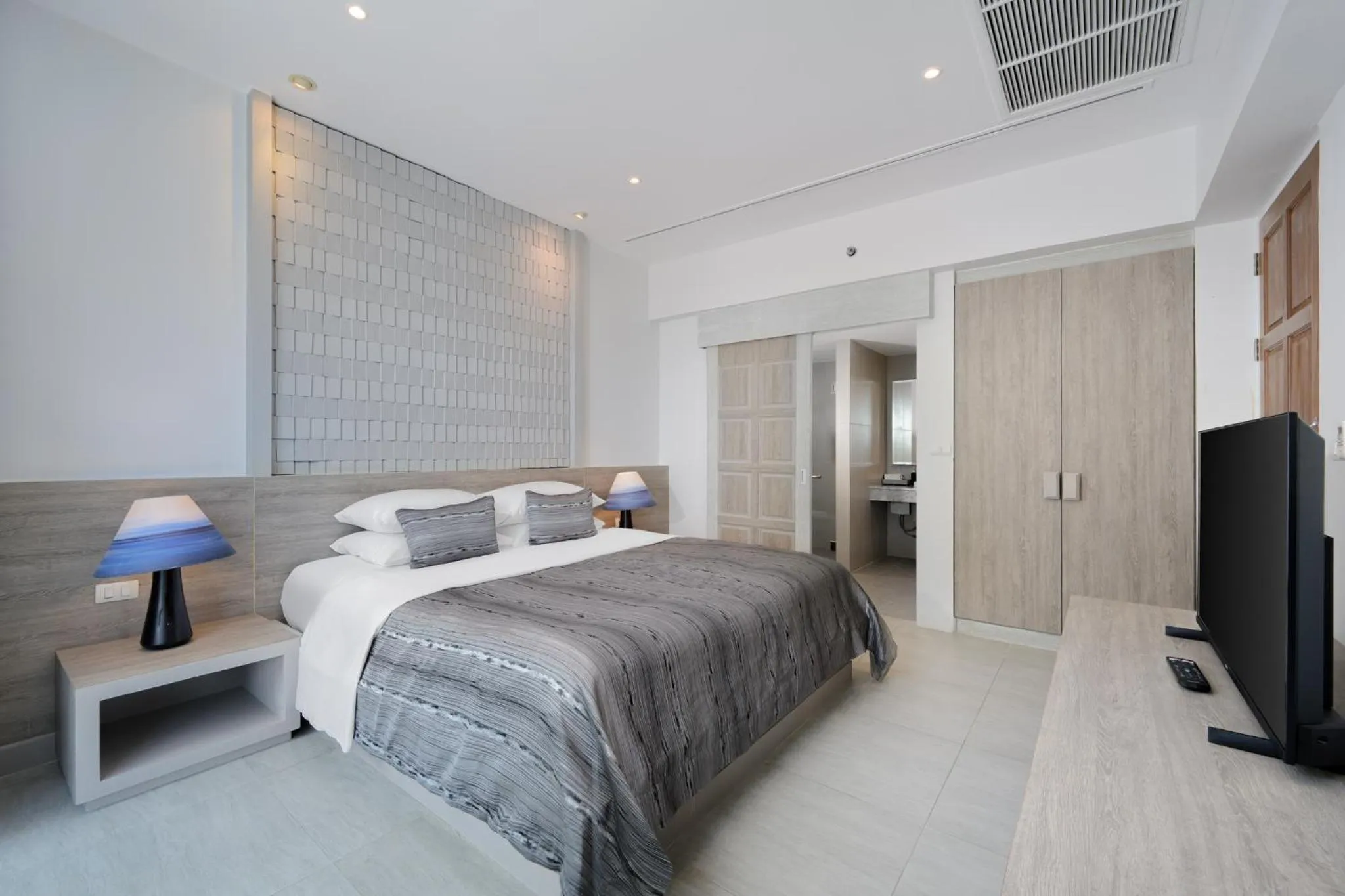 Bed in Andamantra Resort and Villa Phuket