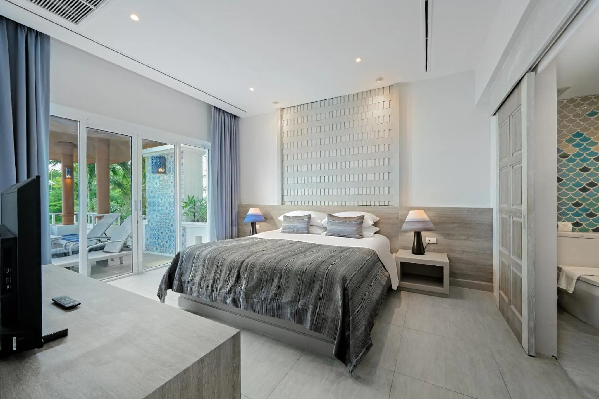Bed in Andamantra Resort and Villa Phuket