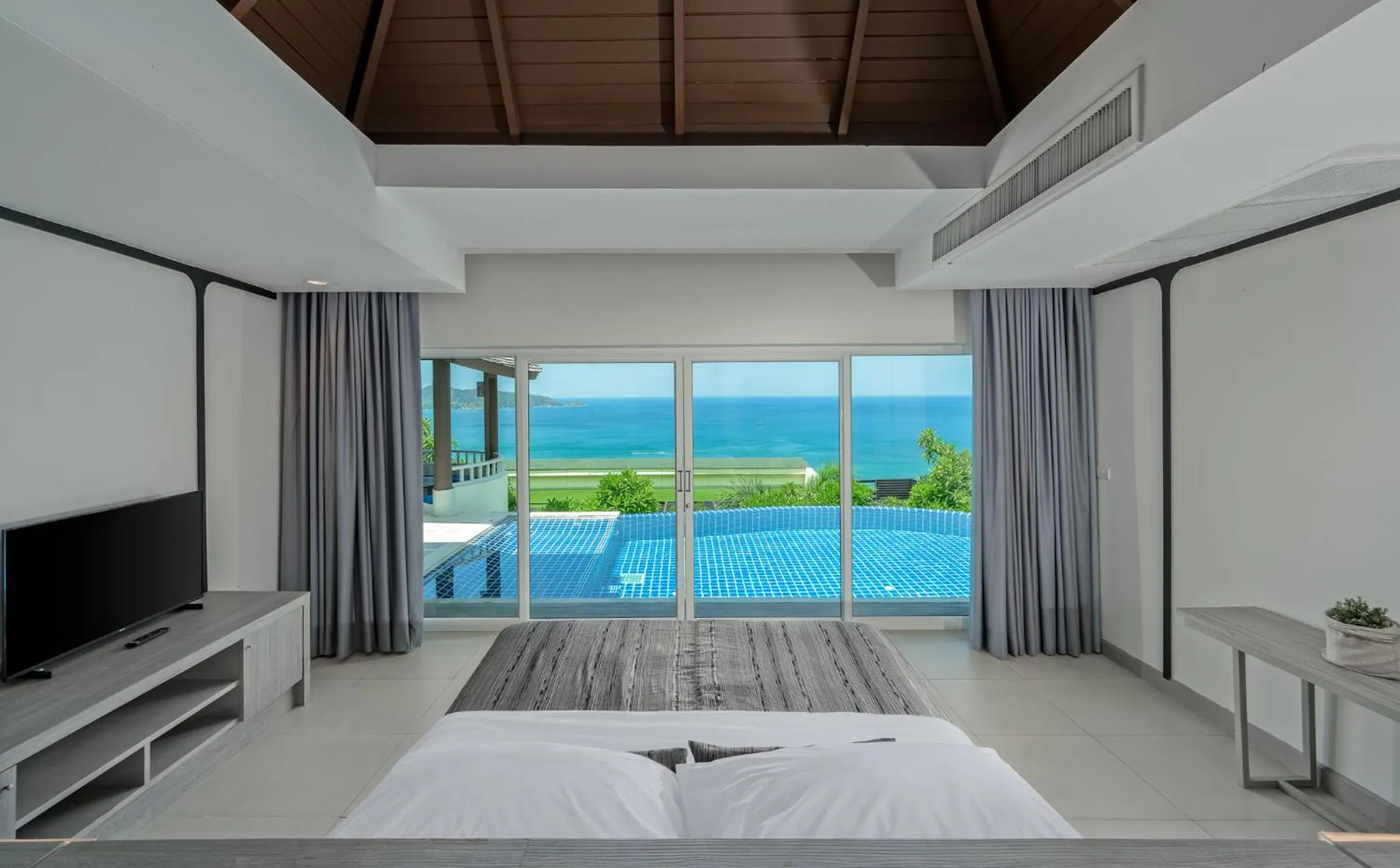 Bed in Andamantra Resort and Villa Phuket