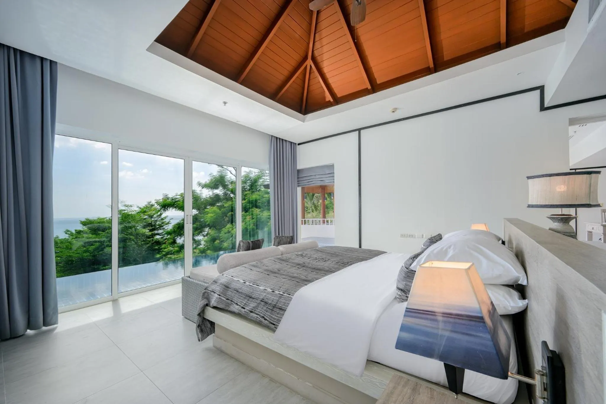 Bed in Andamantra Resort and Villa Phuket
