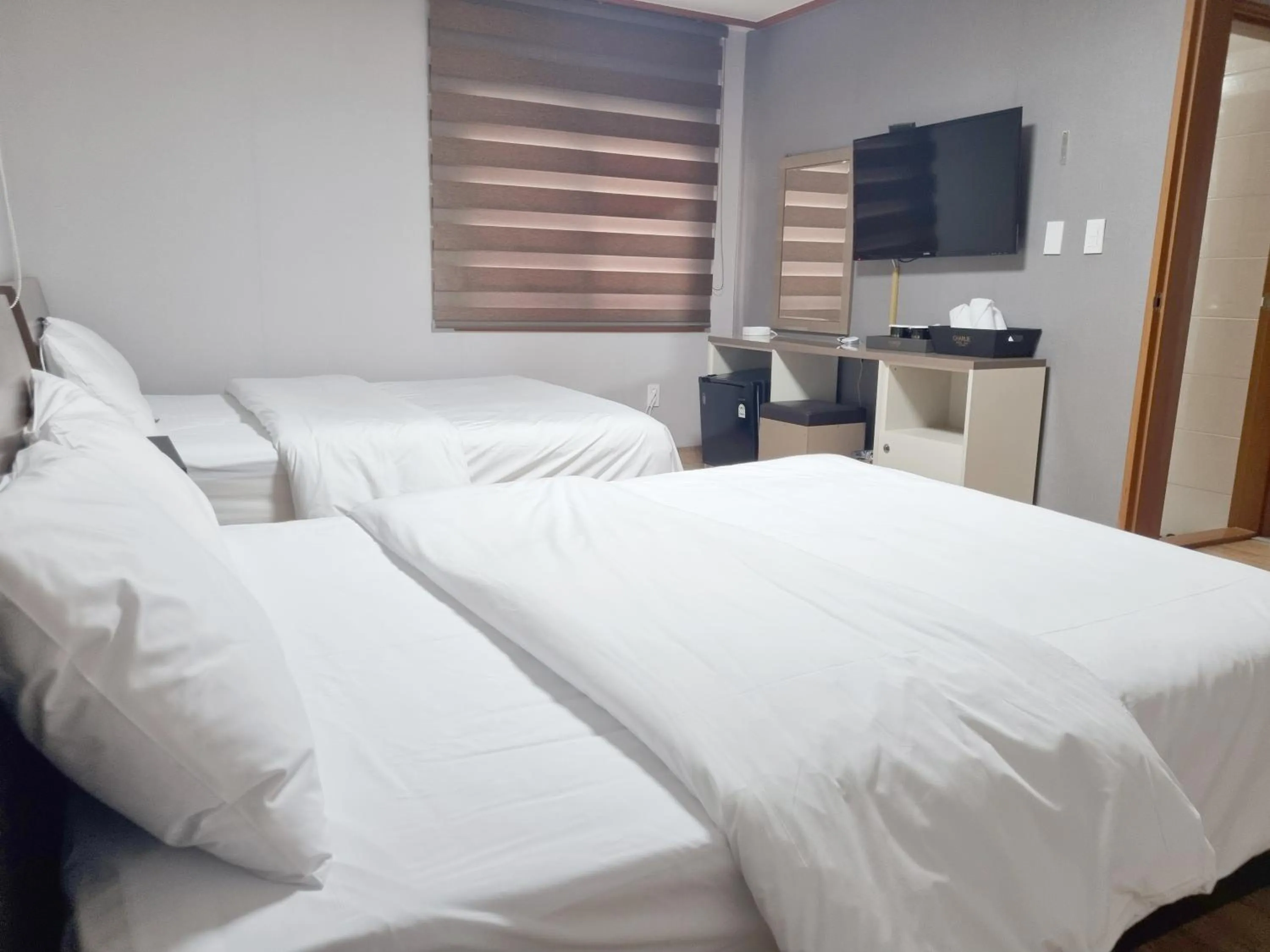 Bed in Charlie Hotel Jeju