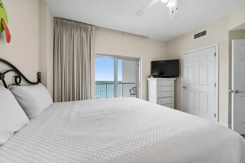 Bed in Crystal Tower 1309 by Youngs Suncoast