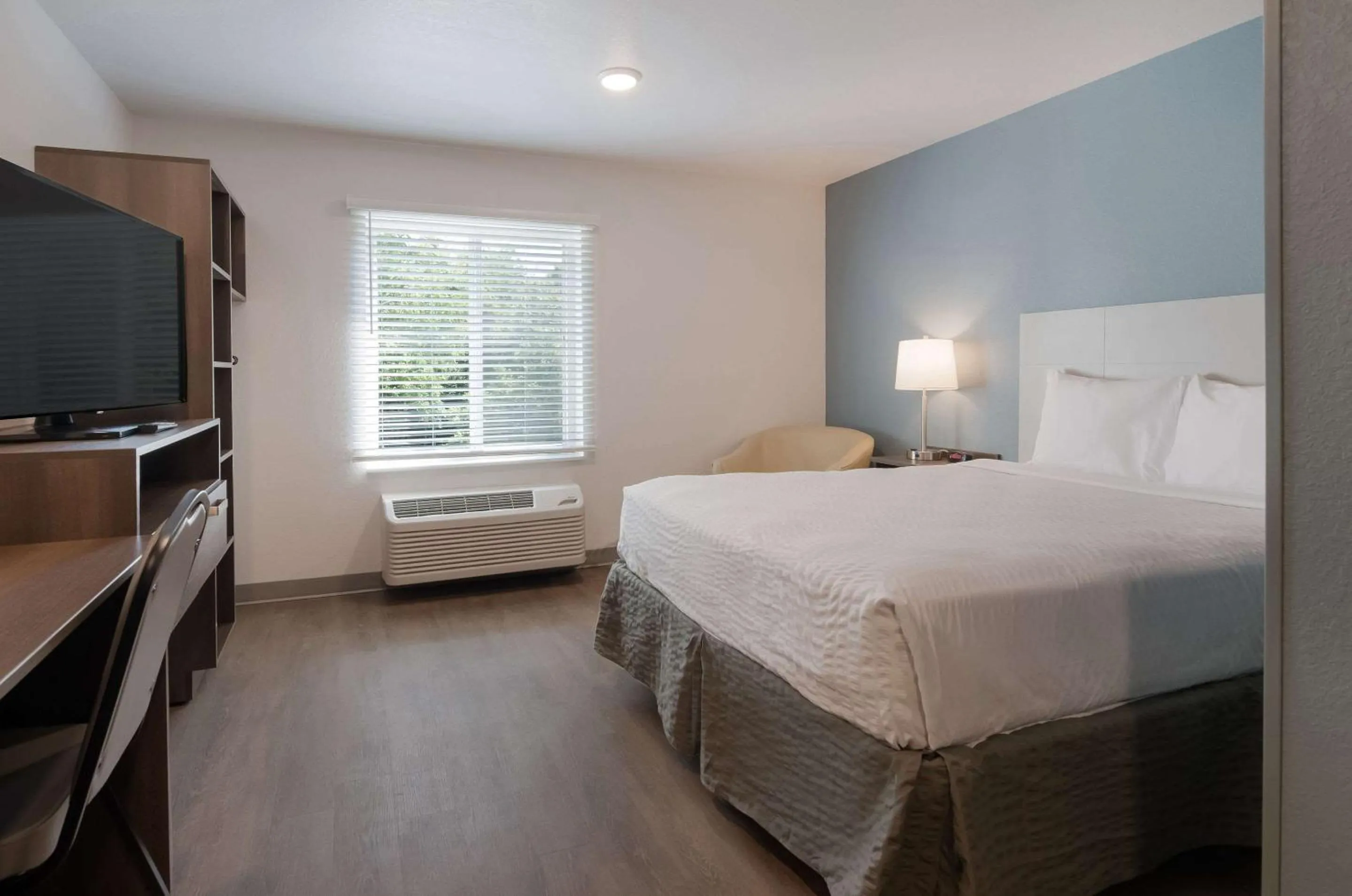 Bedroom, Bed in WoodSpring Suites Lynchburg VA