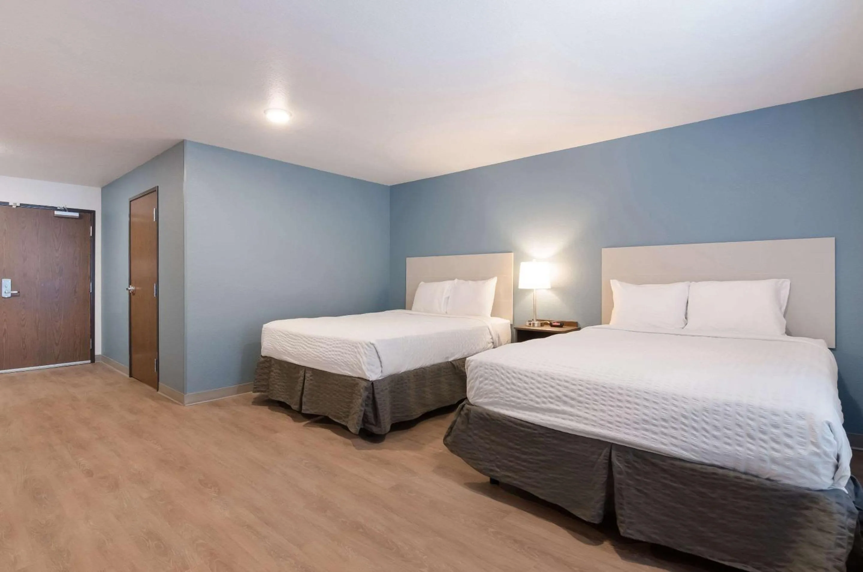 Bedroom, Bed in WoodSpring Suites Lynchburg VA