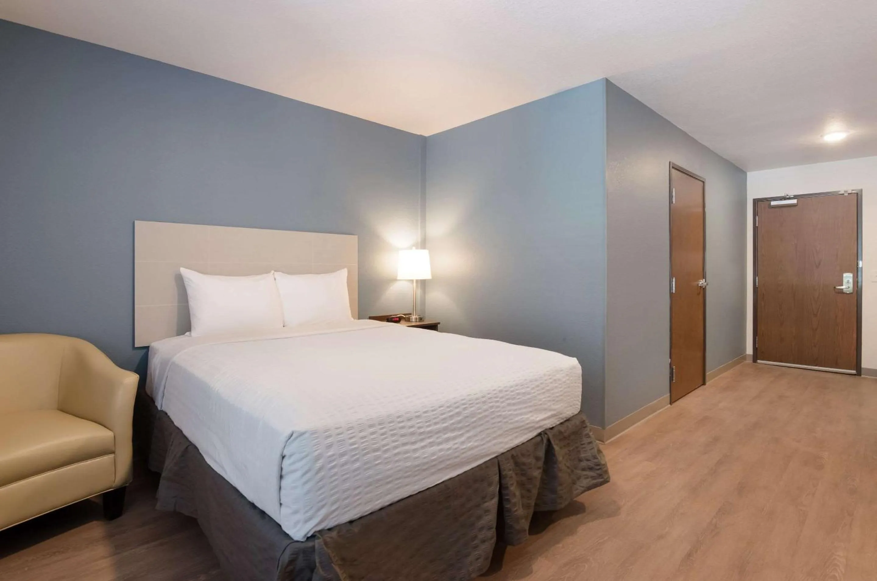 Bedroom, Bed in WoodSpring Suites Lynchburg VA