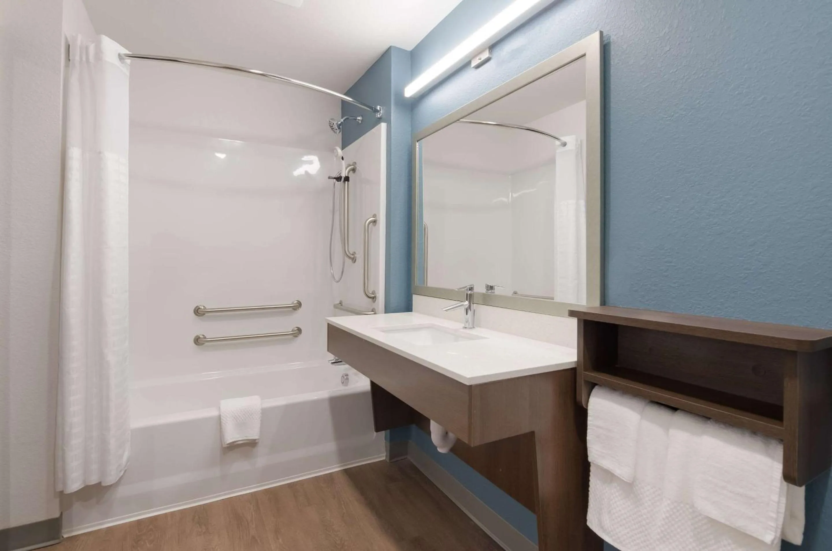 Bathroom in WoodSpring Suites Lynchburg VA