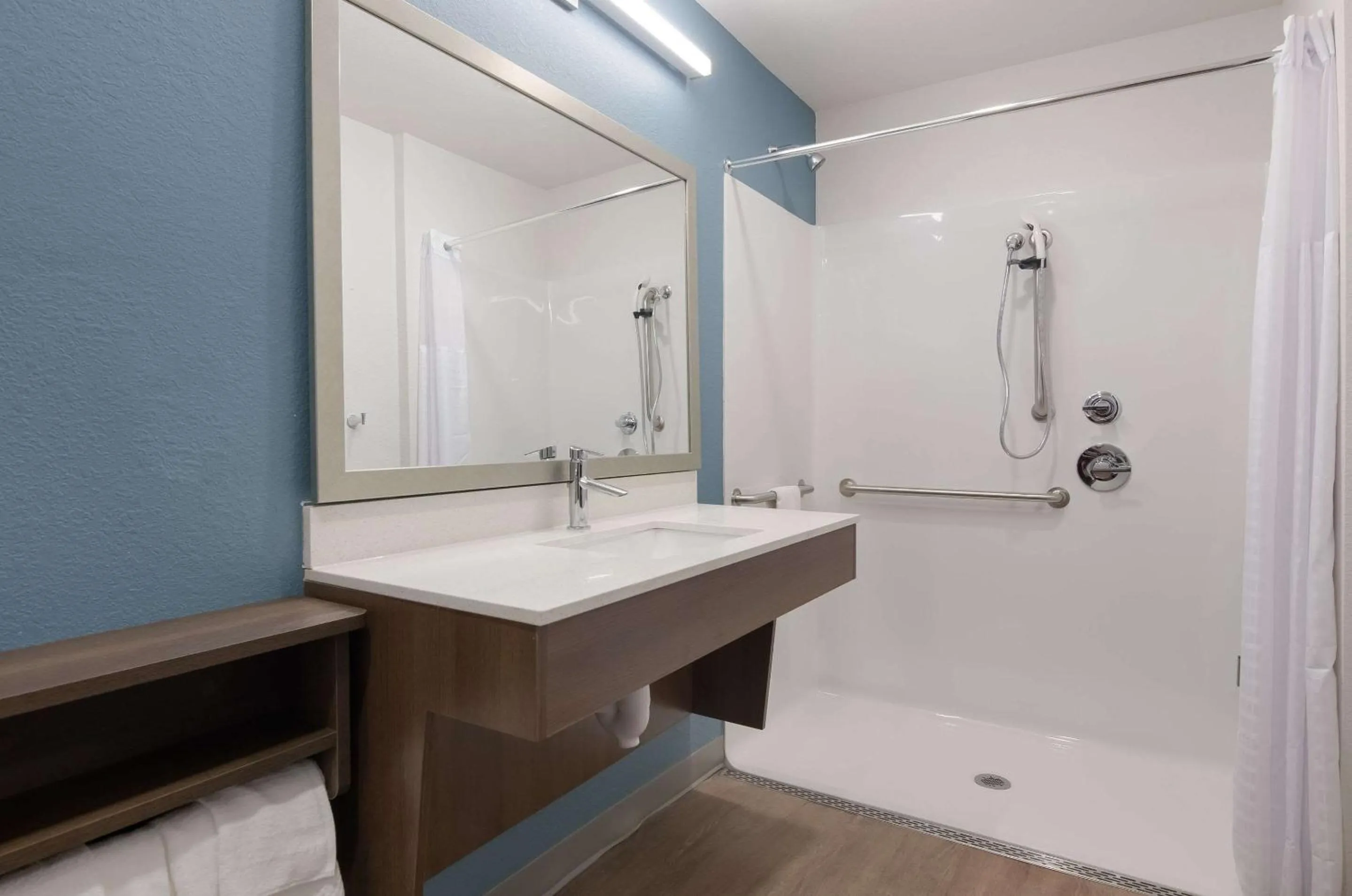 Bathroom in WoodSpring Suites Lynchburg VA