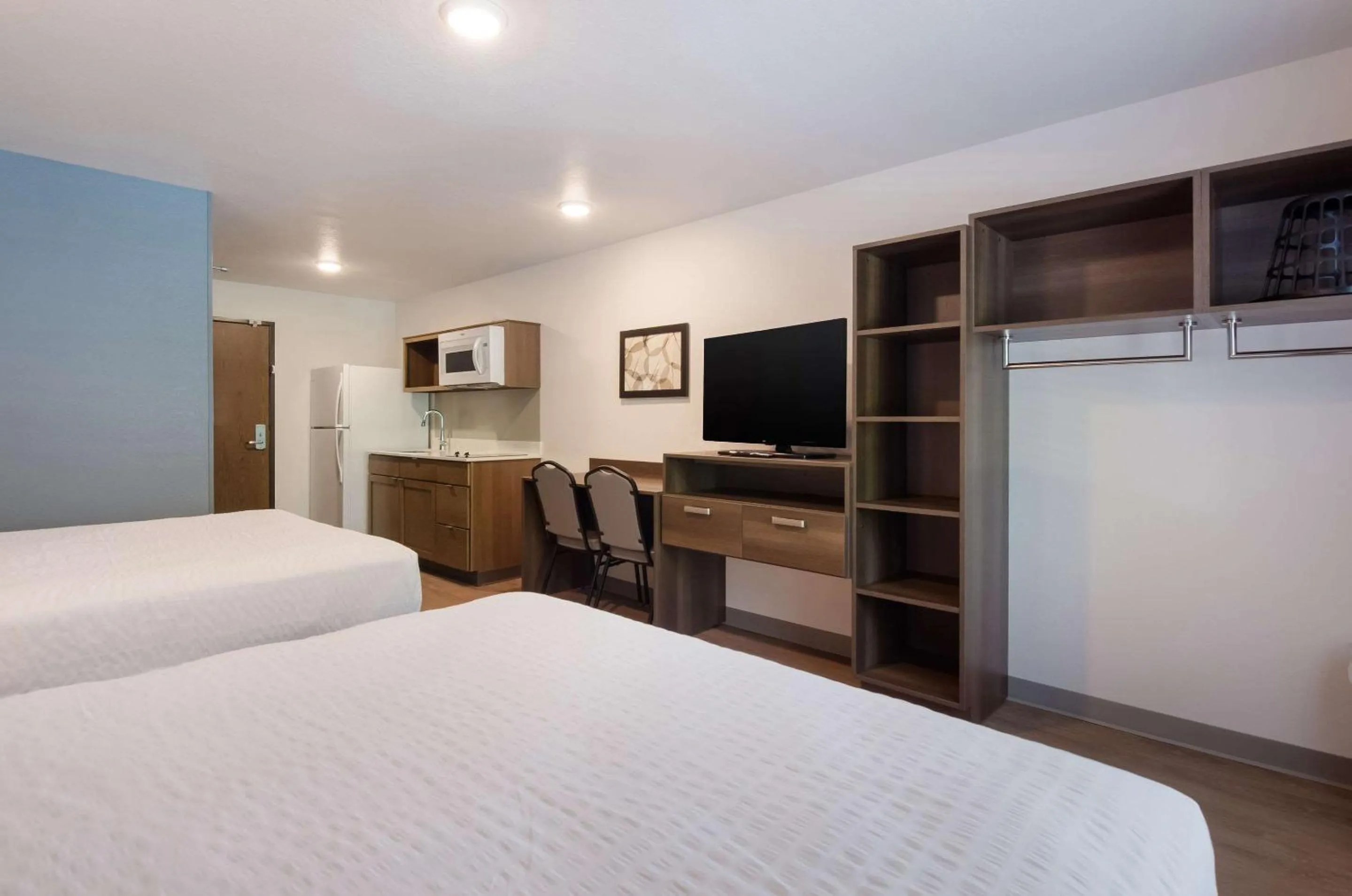 Bedroom, Bed in WoodSpring Suites Lynchburg VA