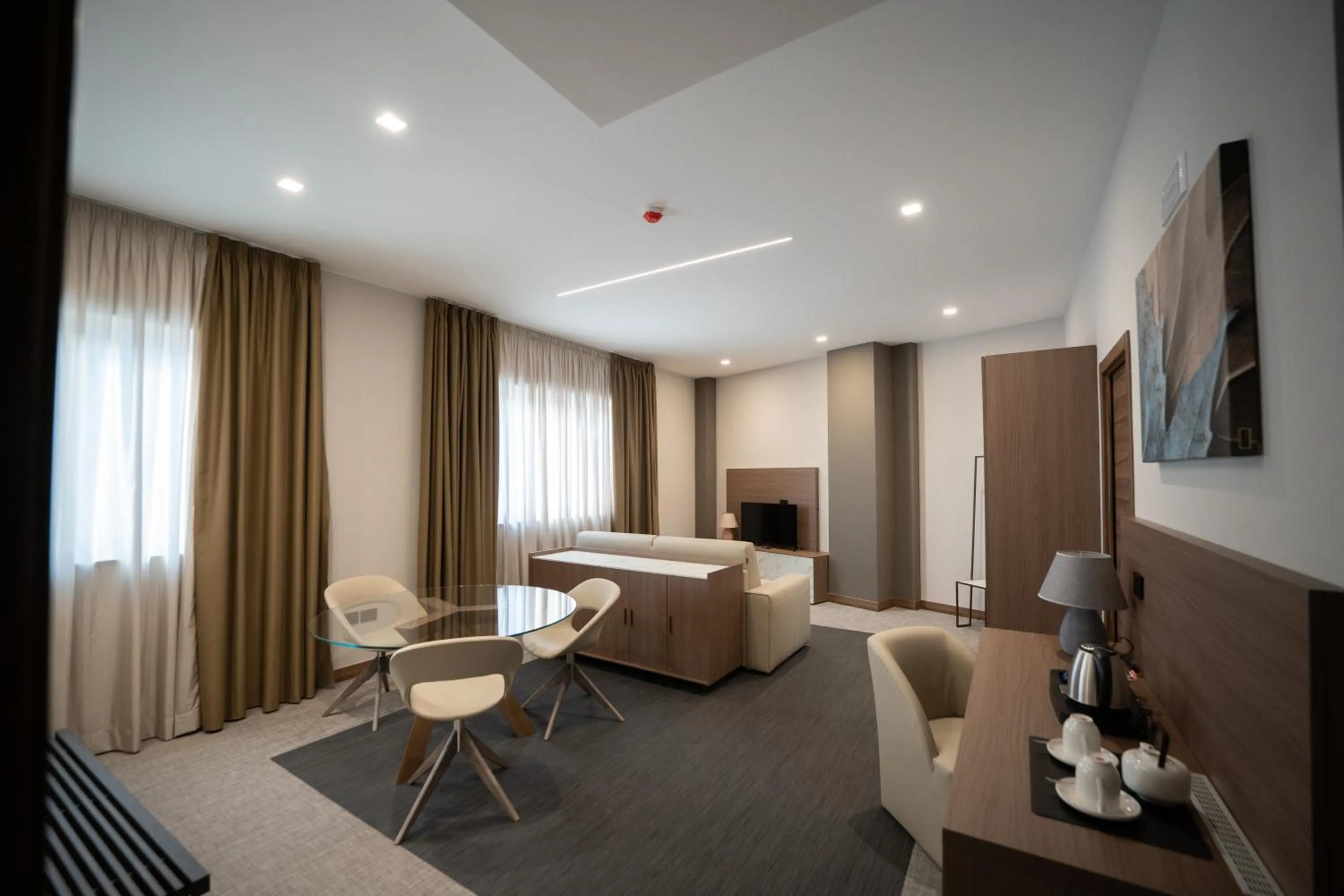 Living room, Bed in Building Hotel