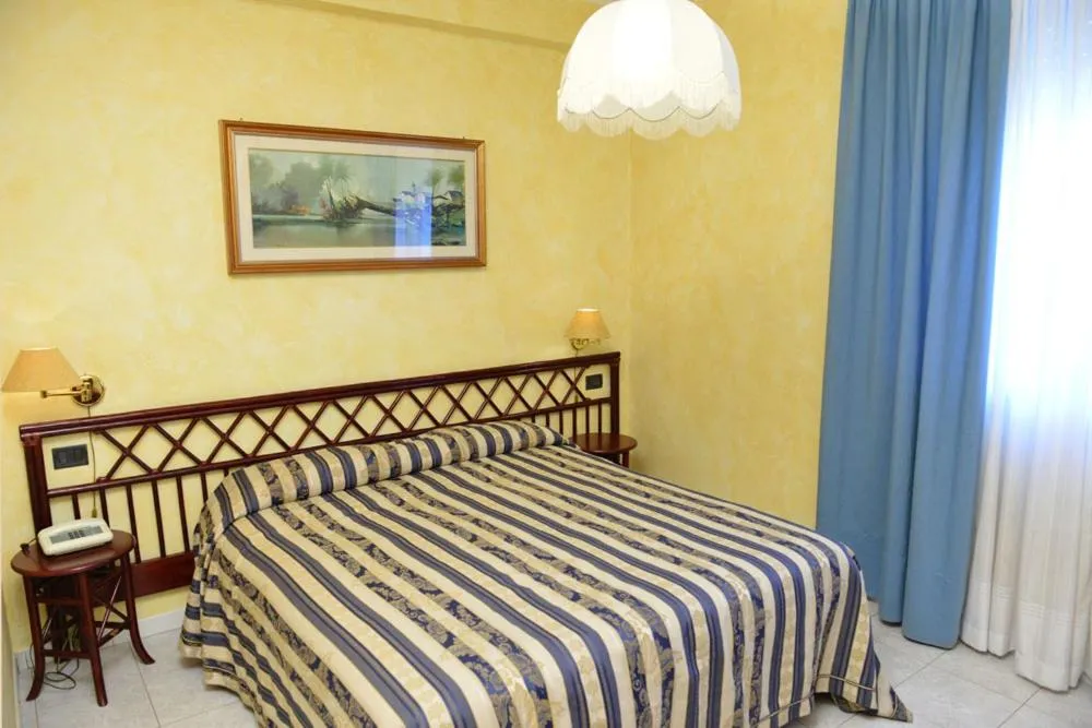 Bed in Hotel Blue Rose's