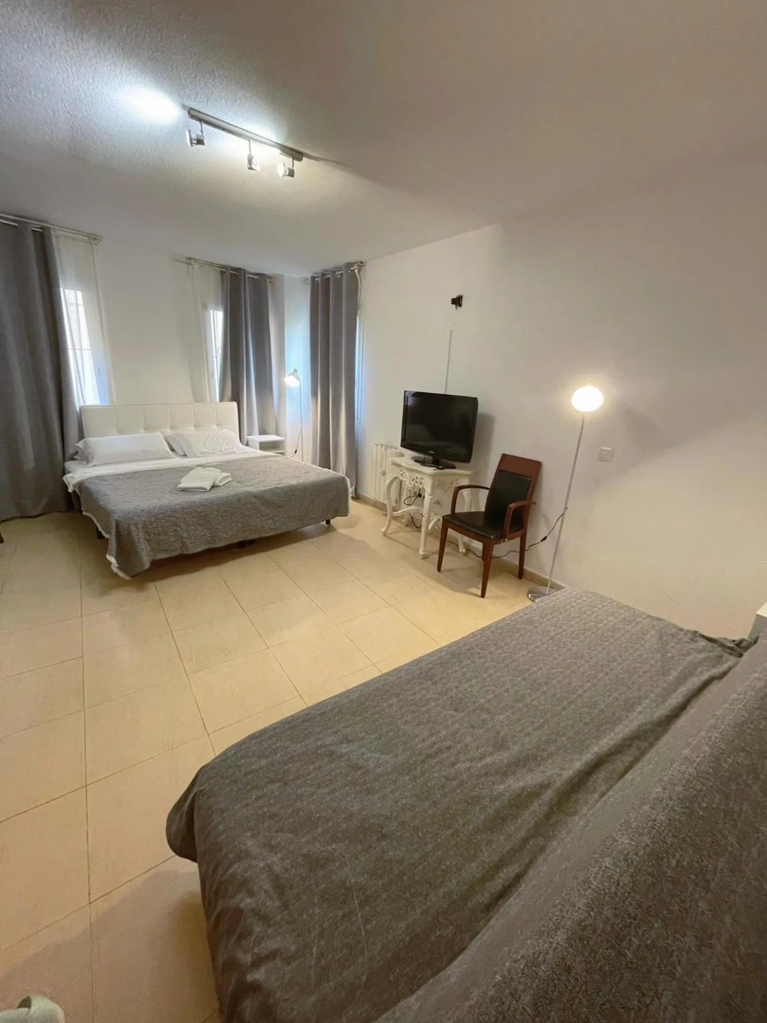 Bed in Royal Inn Aparthotel