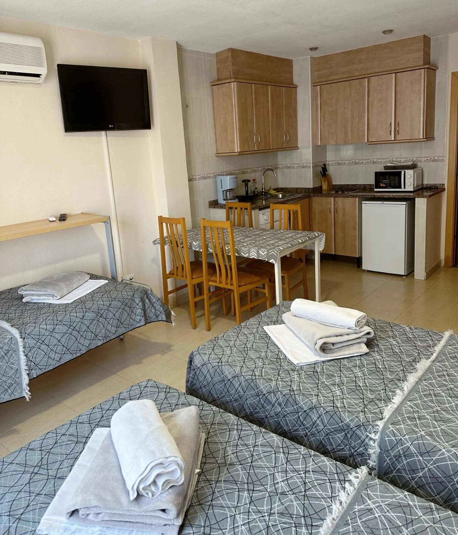 Bed in Royal Inn Aparthotel