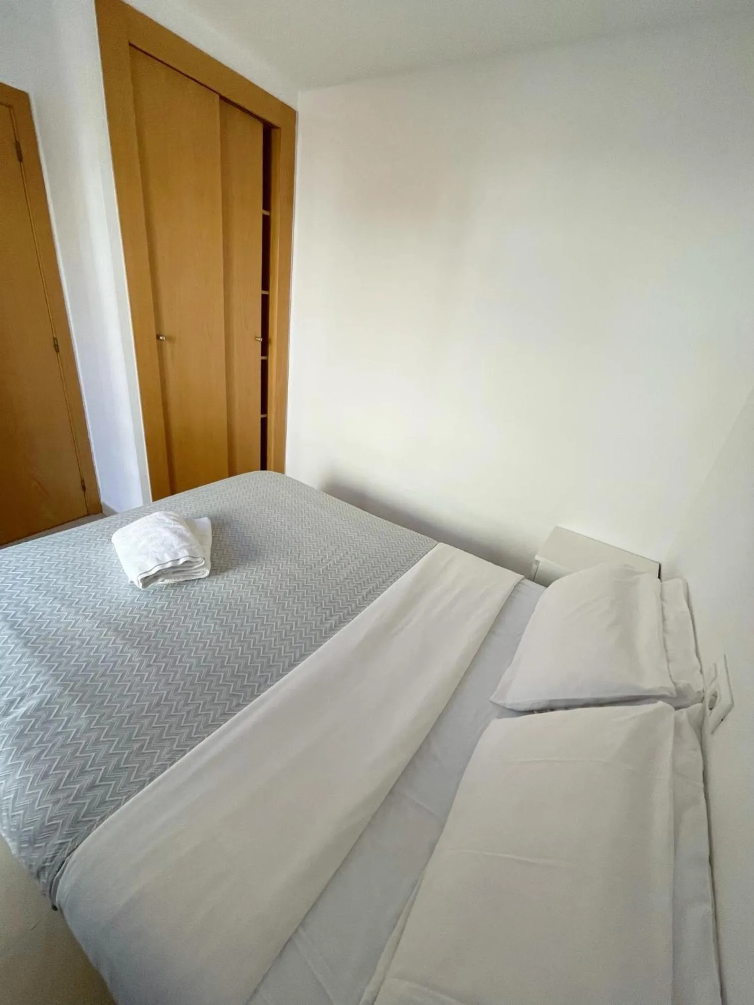 Bed in Royal Inn Aparthotel