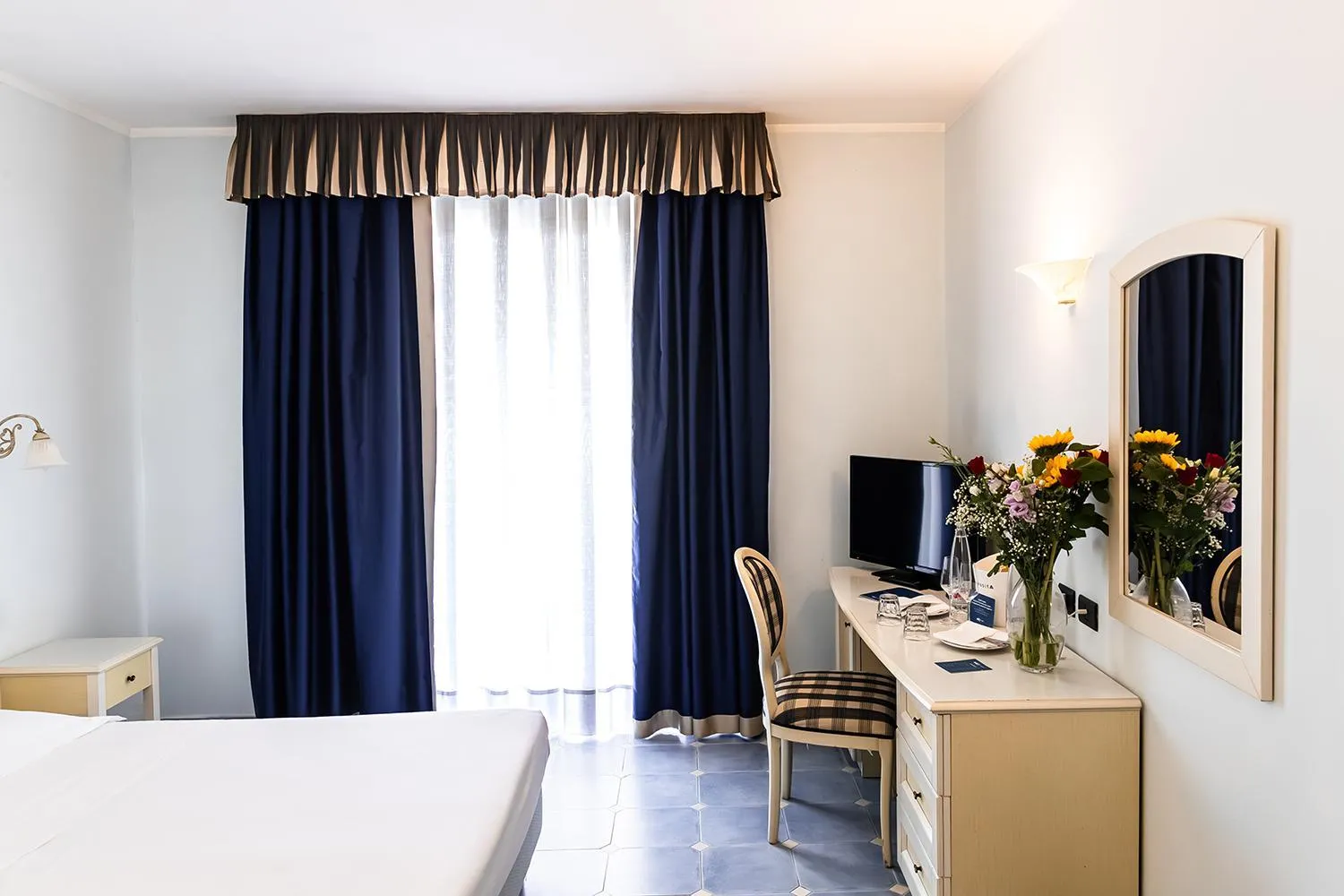 Bed in Baia dei Mulini Resort & Spa