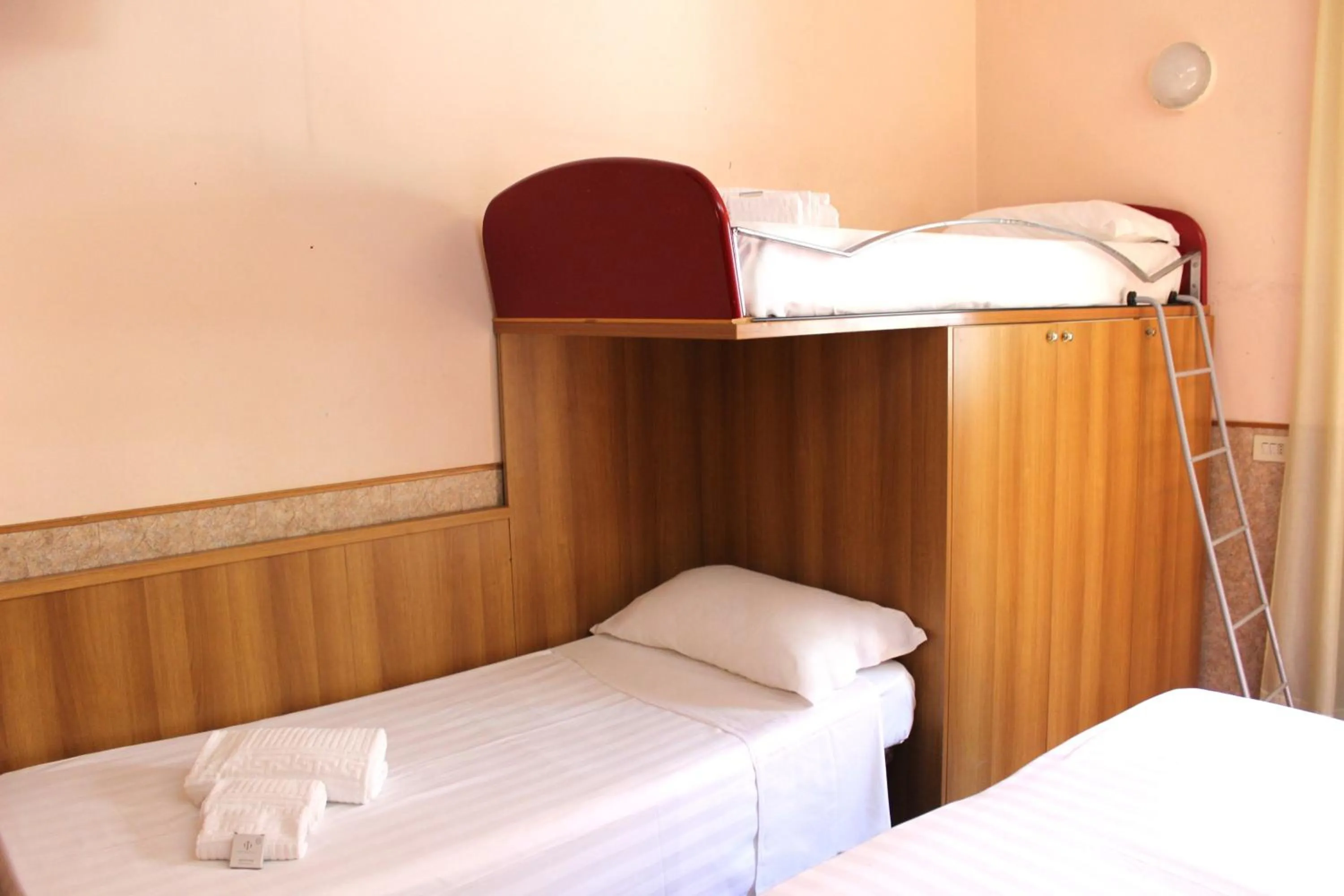 Bed in Phi Hotel Ambra