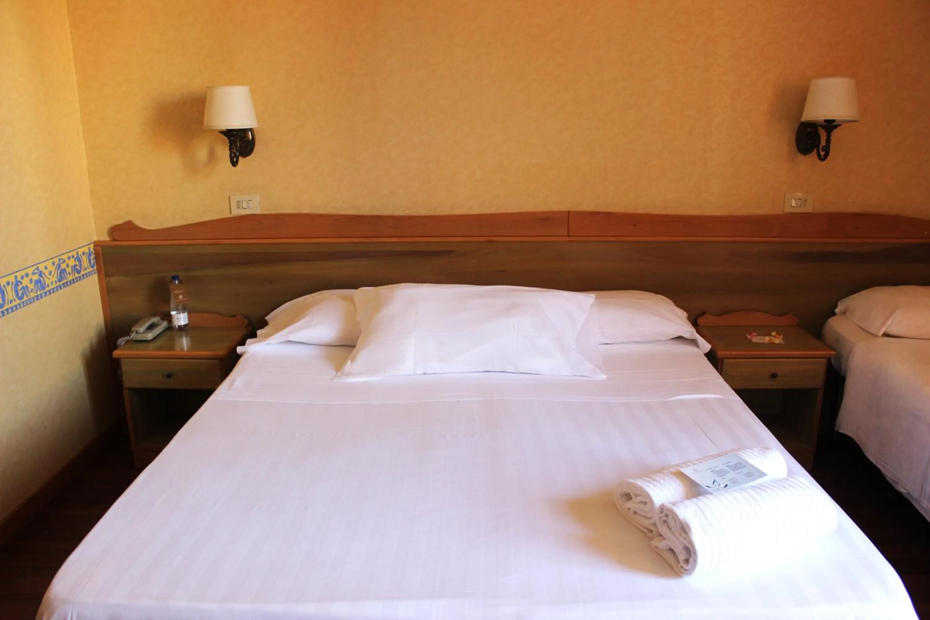 Bed in Phi Hotel Ambra