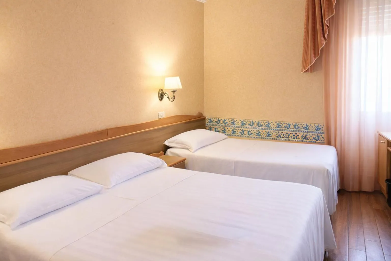 Bed in Phi Hotel Ambra