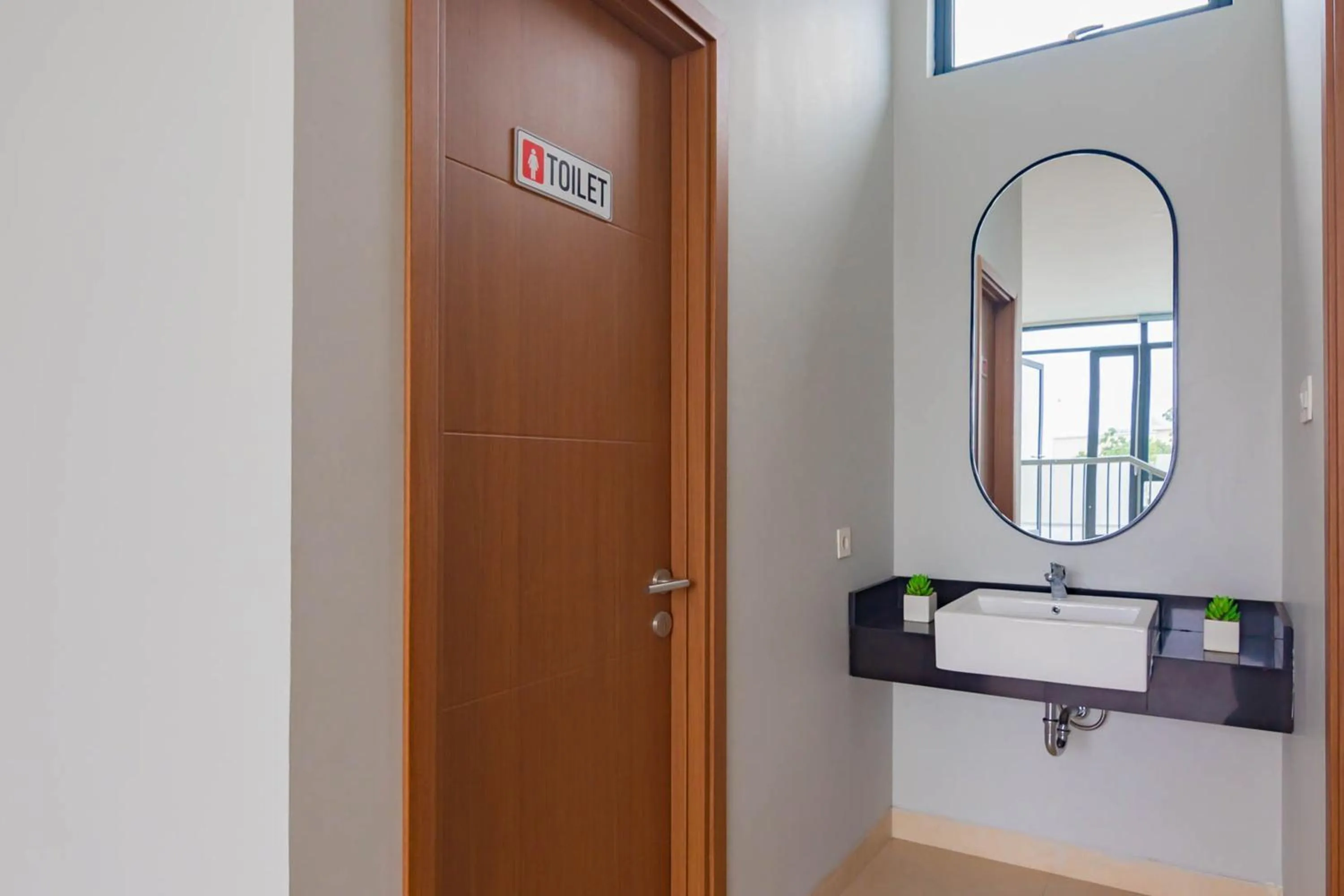 Bathroom in Sans Hotel Alexander Bandung